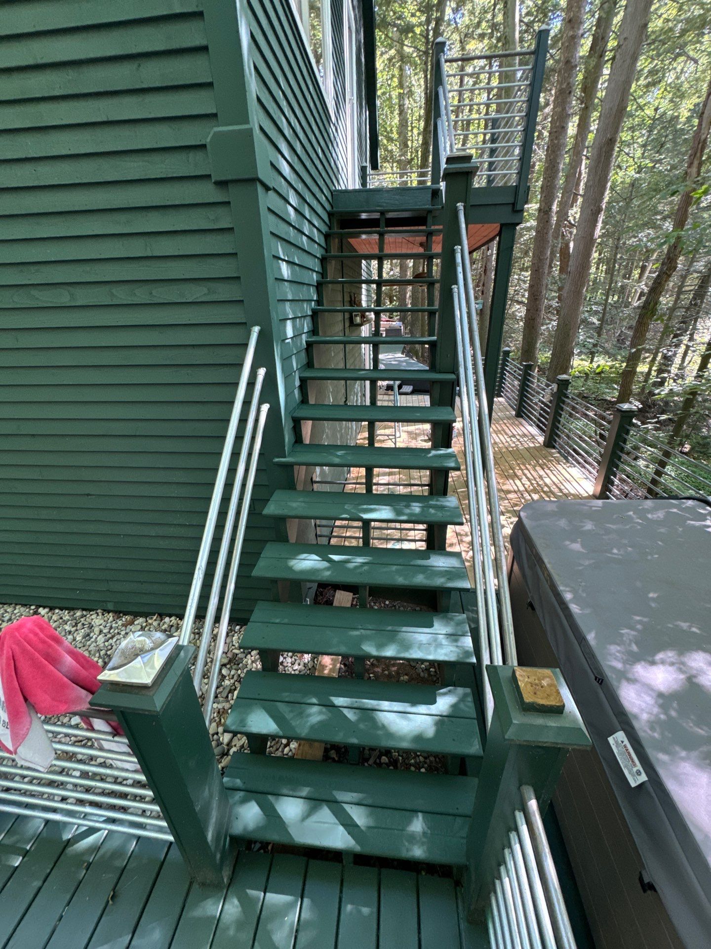 Solid staining decking and stairs. by Gordon Painting