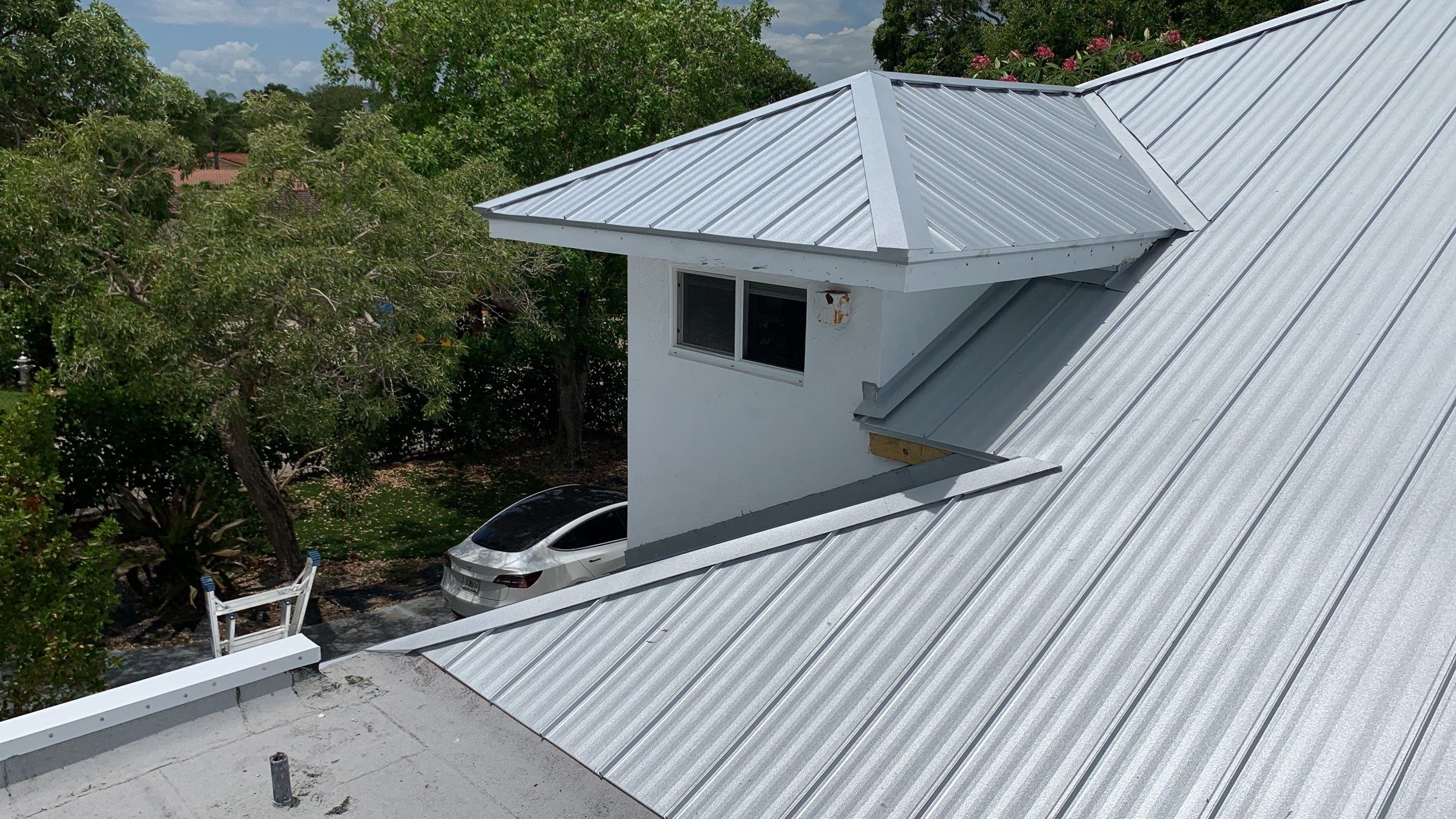 Residential Roofing Installation using 1" Nail strip metal roof by BLUES BROTHERS ROOFING