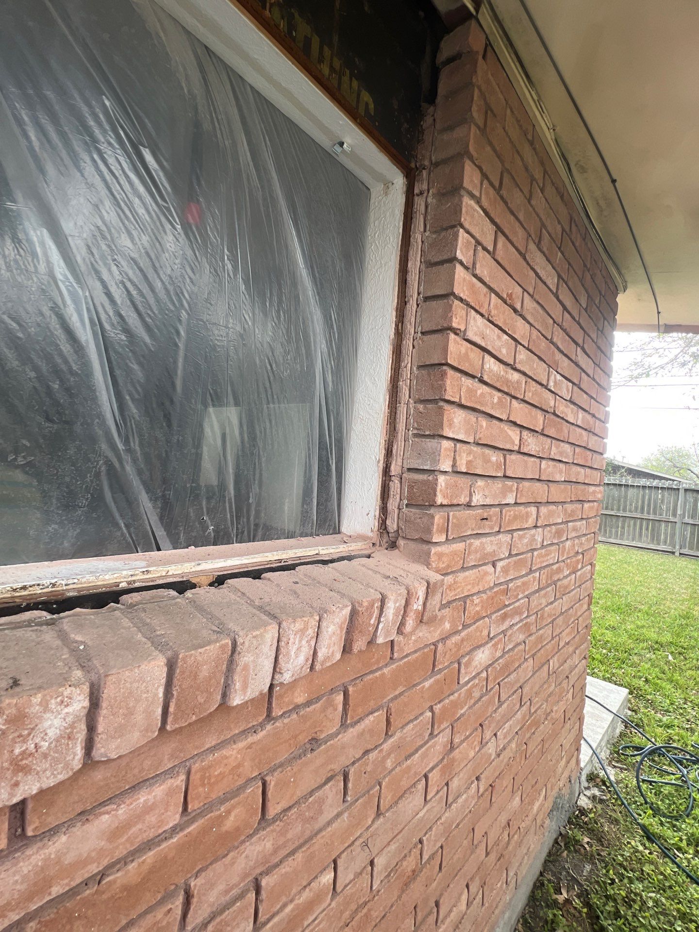 Windows in Brick with a Bay Window by Bayfront Roofing and Construction