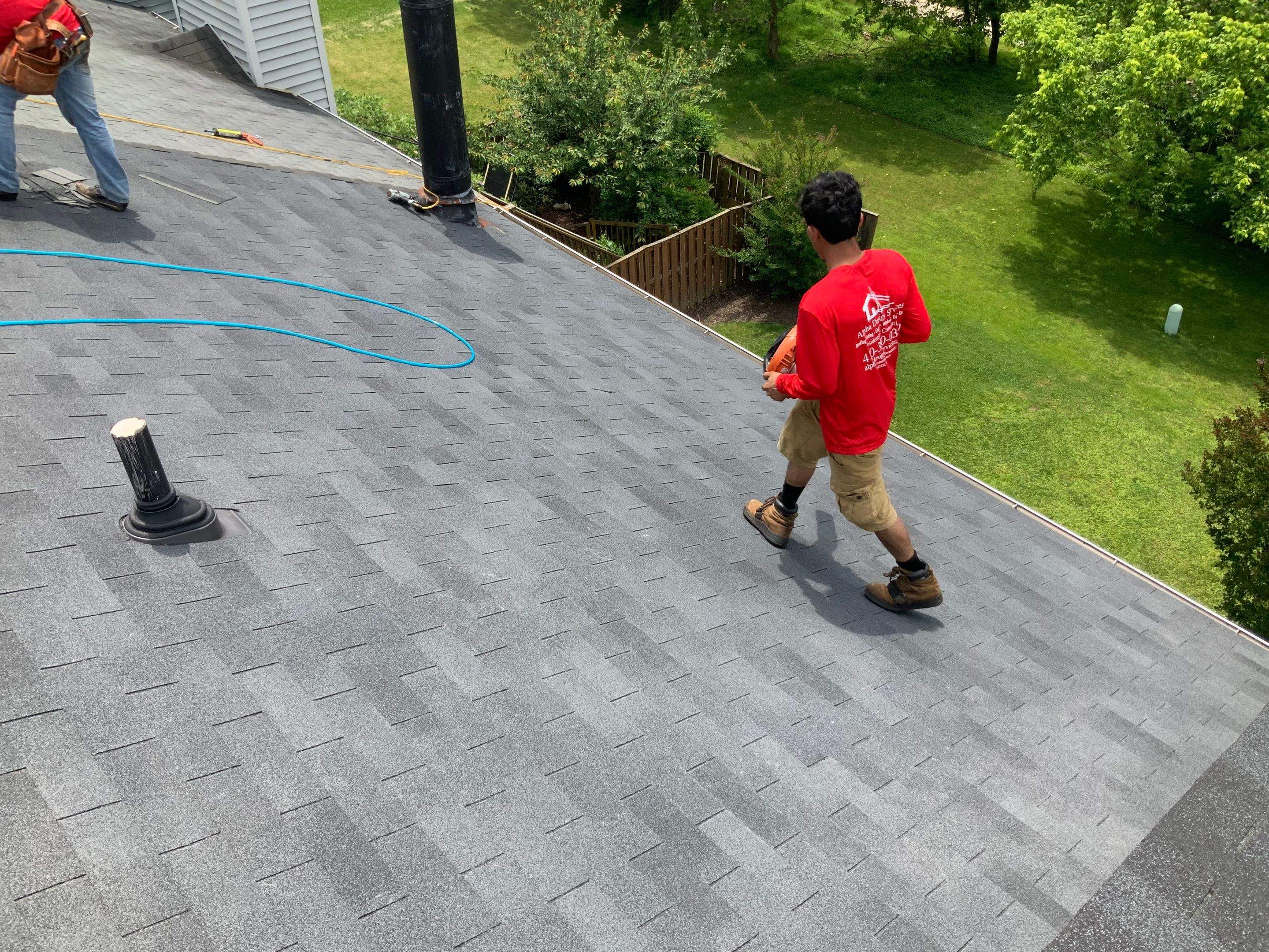 Residential Roofing Installation using XT-25 Color Moire Black by Alpha Design Services