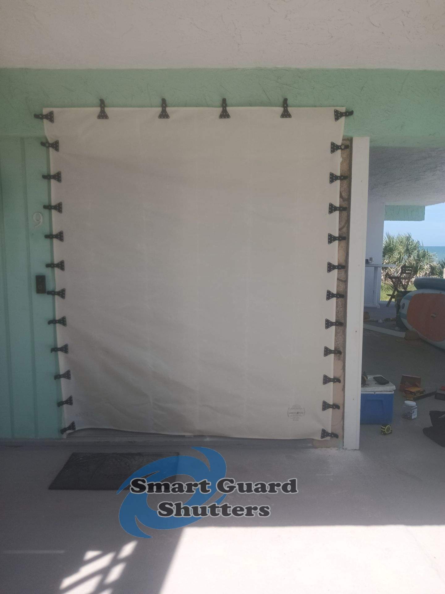 Hurricane Fabric in White by Smart Guard Shutters