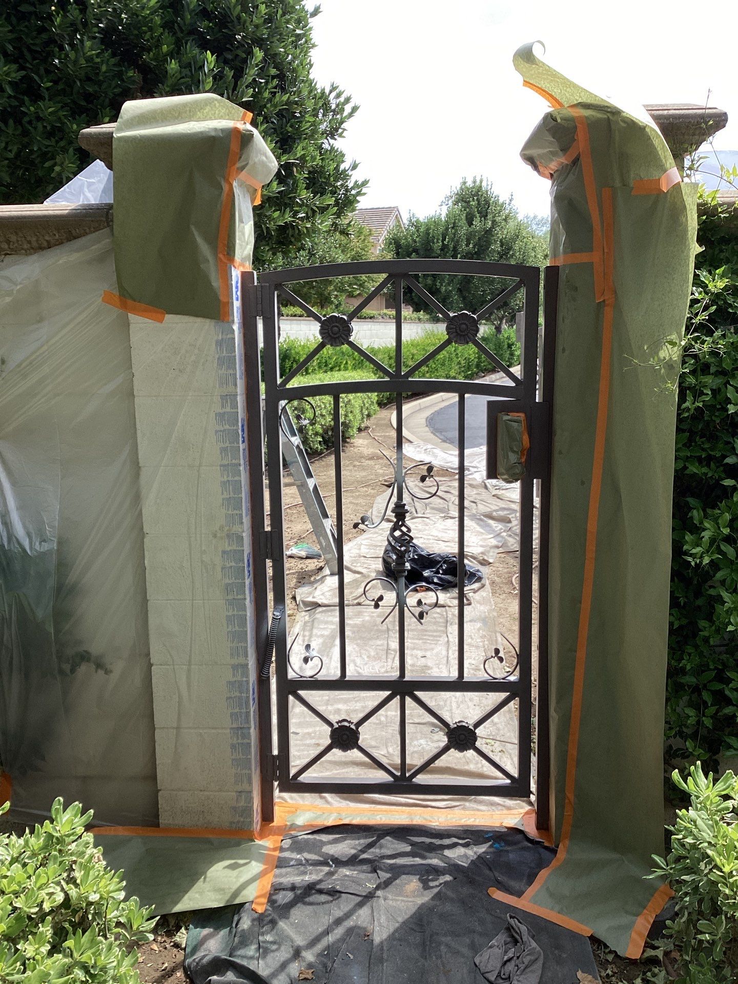 Exterior Painting Iron Gates in Modesto by Lancaster Painting