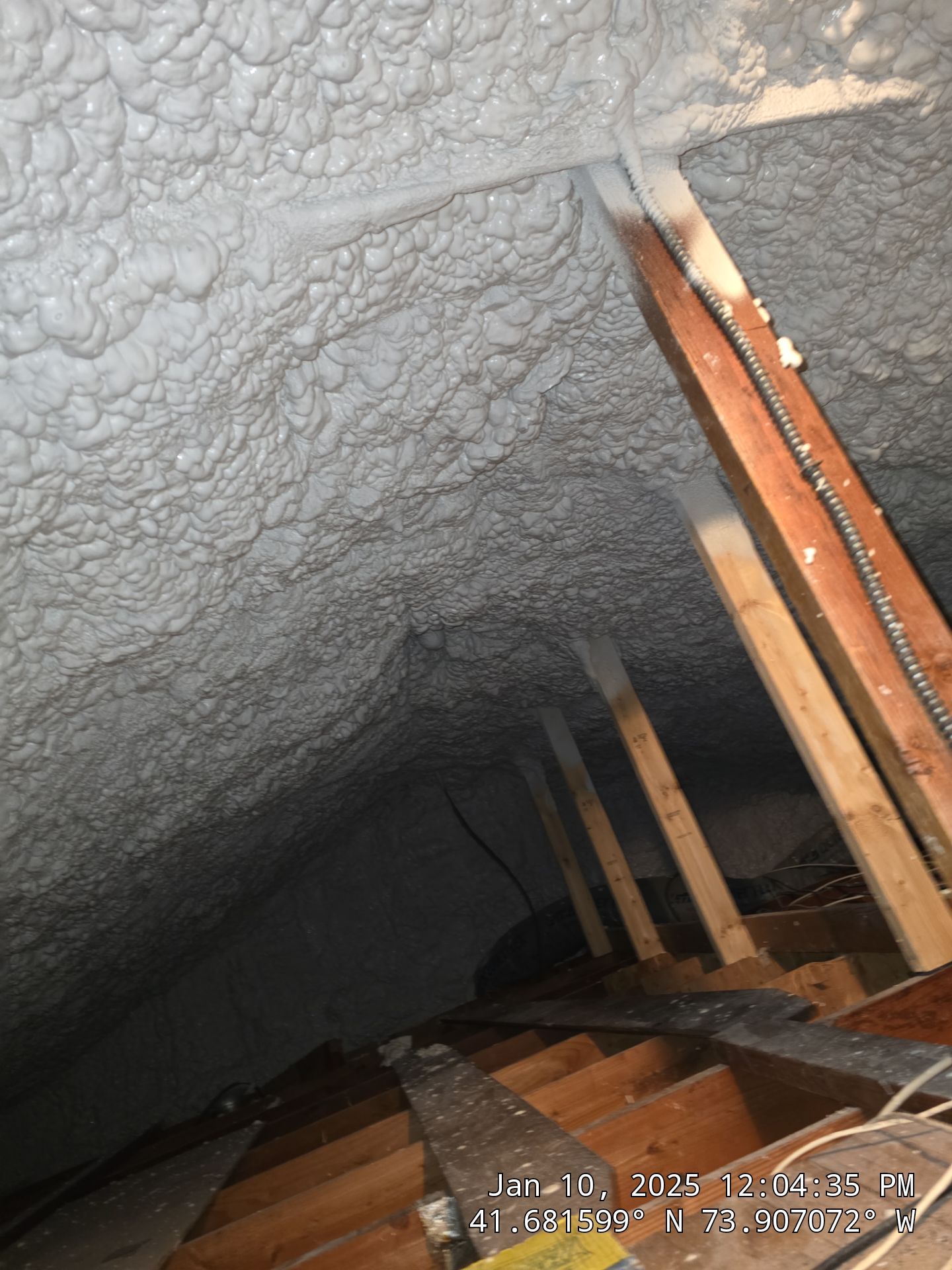 Attic Insulation using open cell spray foam by NYS Foam & Energy