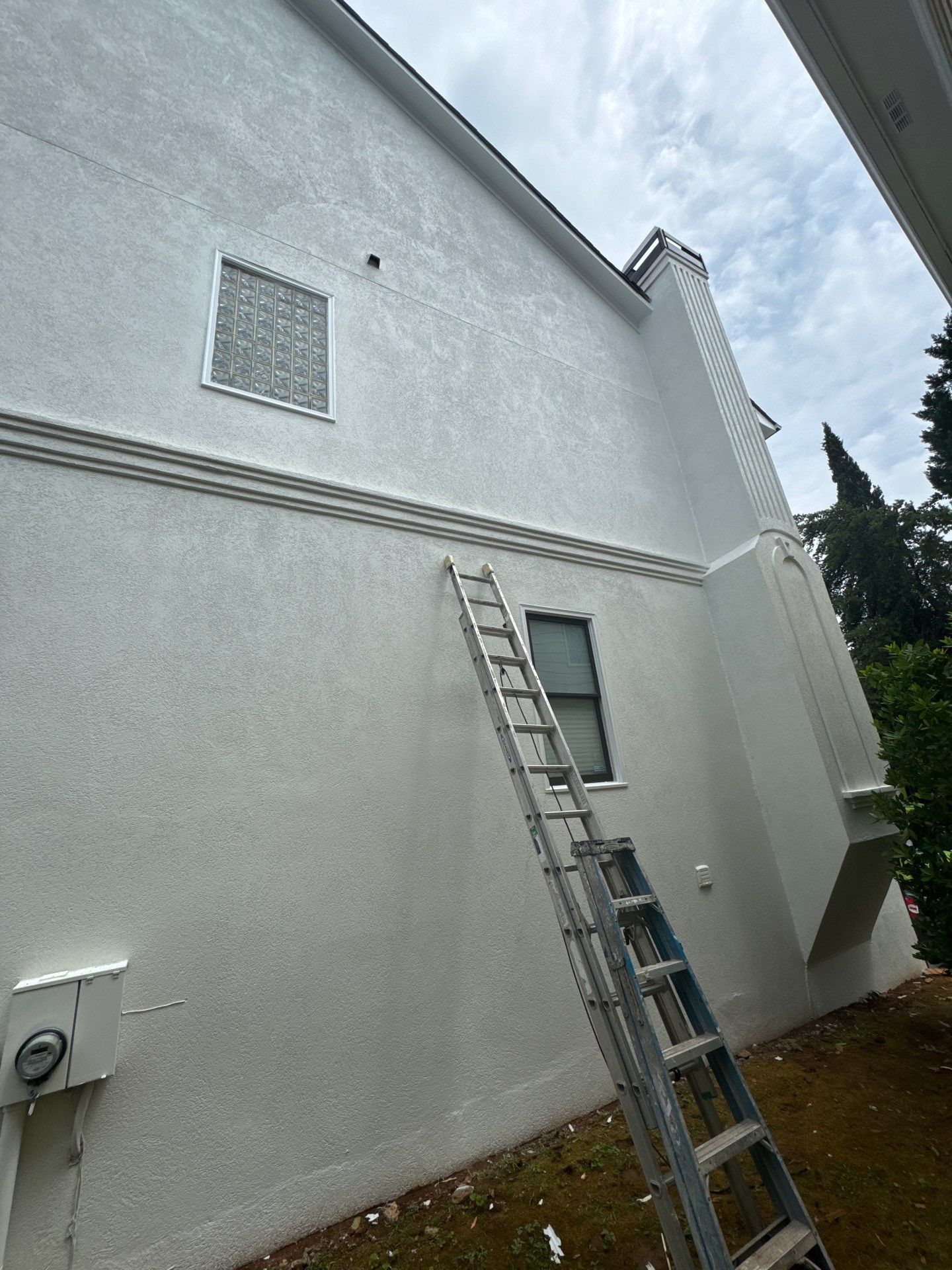 Full Exterior Stucco Painting and Wood Deck Staining in Atlanta by Swift Home Renovations