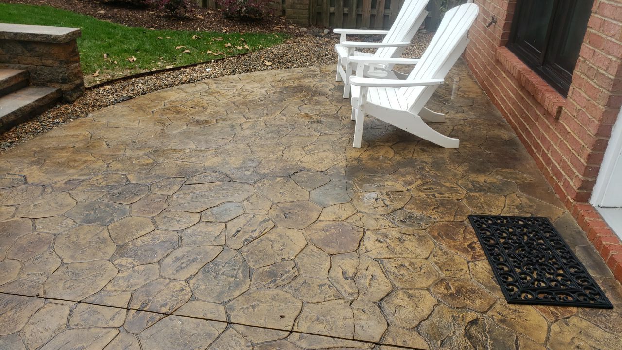 patio cleaning using cleaner by Power Wash Masters LLC