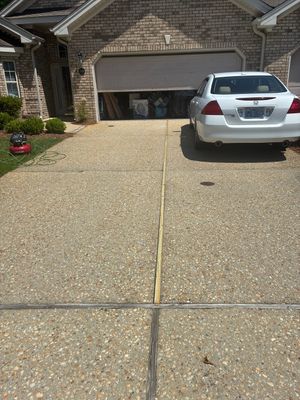 Exposed Aggregate Driveway Joint Repair in Jefferson Landing, Leland, NC