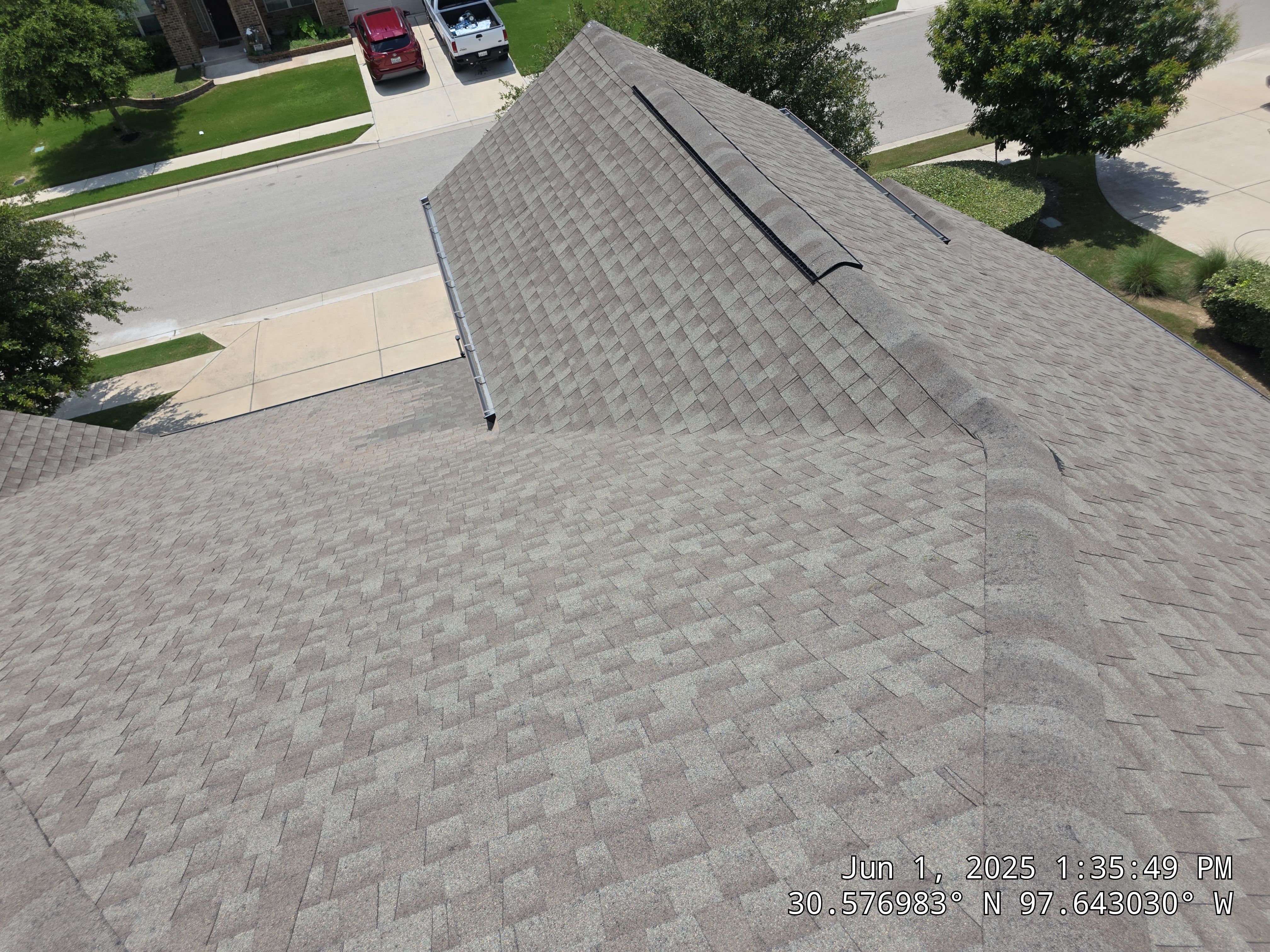 Architectural Shingle Roof Replacement and Hail Damage Restoration in Round Rock by Caliber Restoration LLC