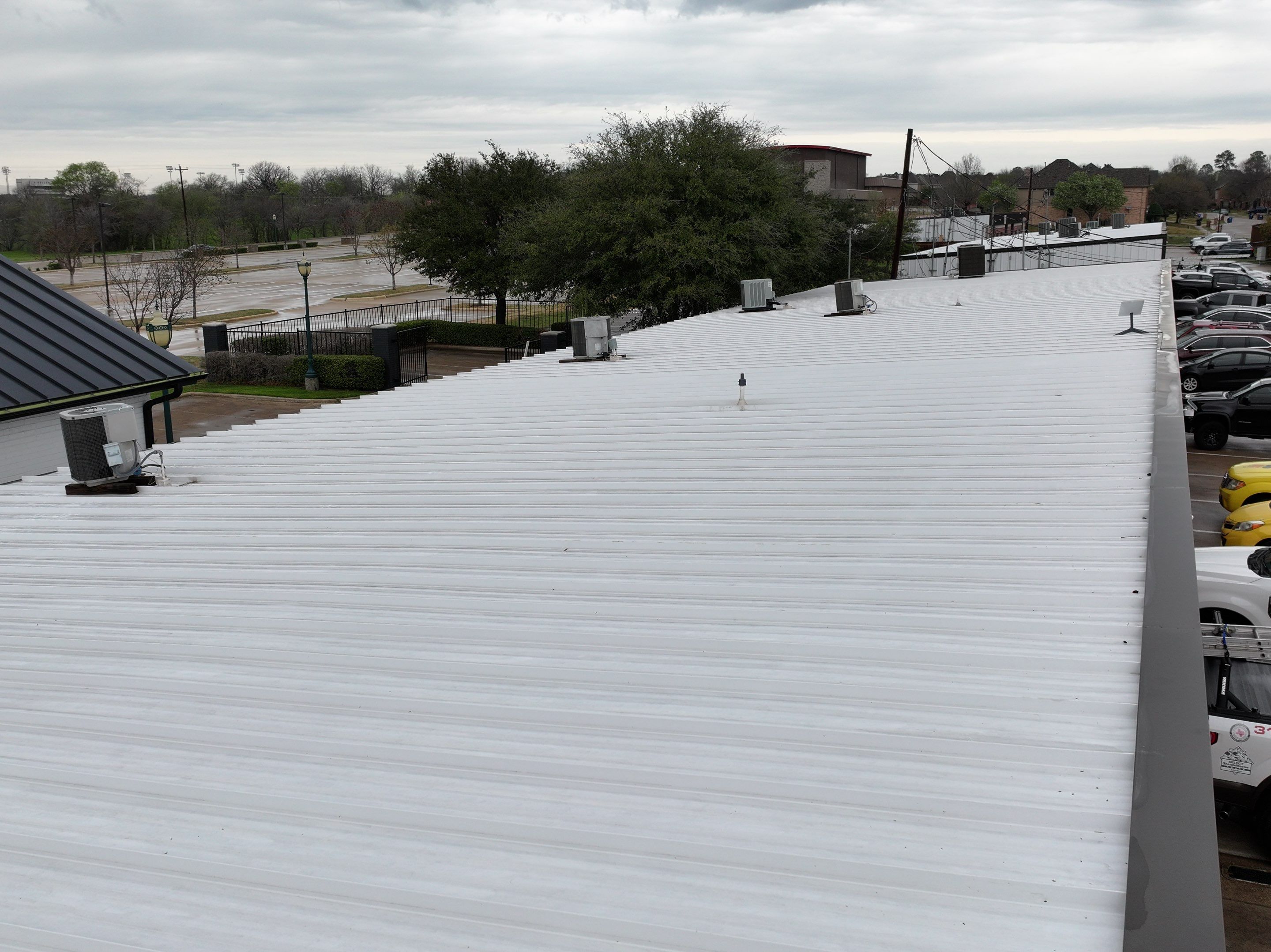 Commercial Roofing Installation using Double lock Mechanical Standing Seam Metal by Becker Roofing and Exteriors