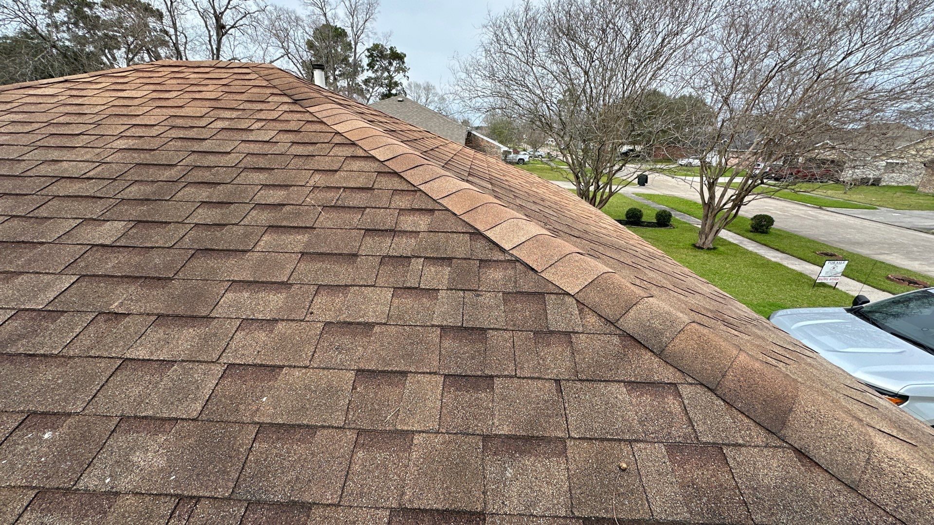 Roof Replacement with Ridge Vent & Flashing Details — Conroe, TX by PL Roofing & SB Roofing, LLC.