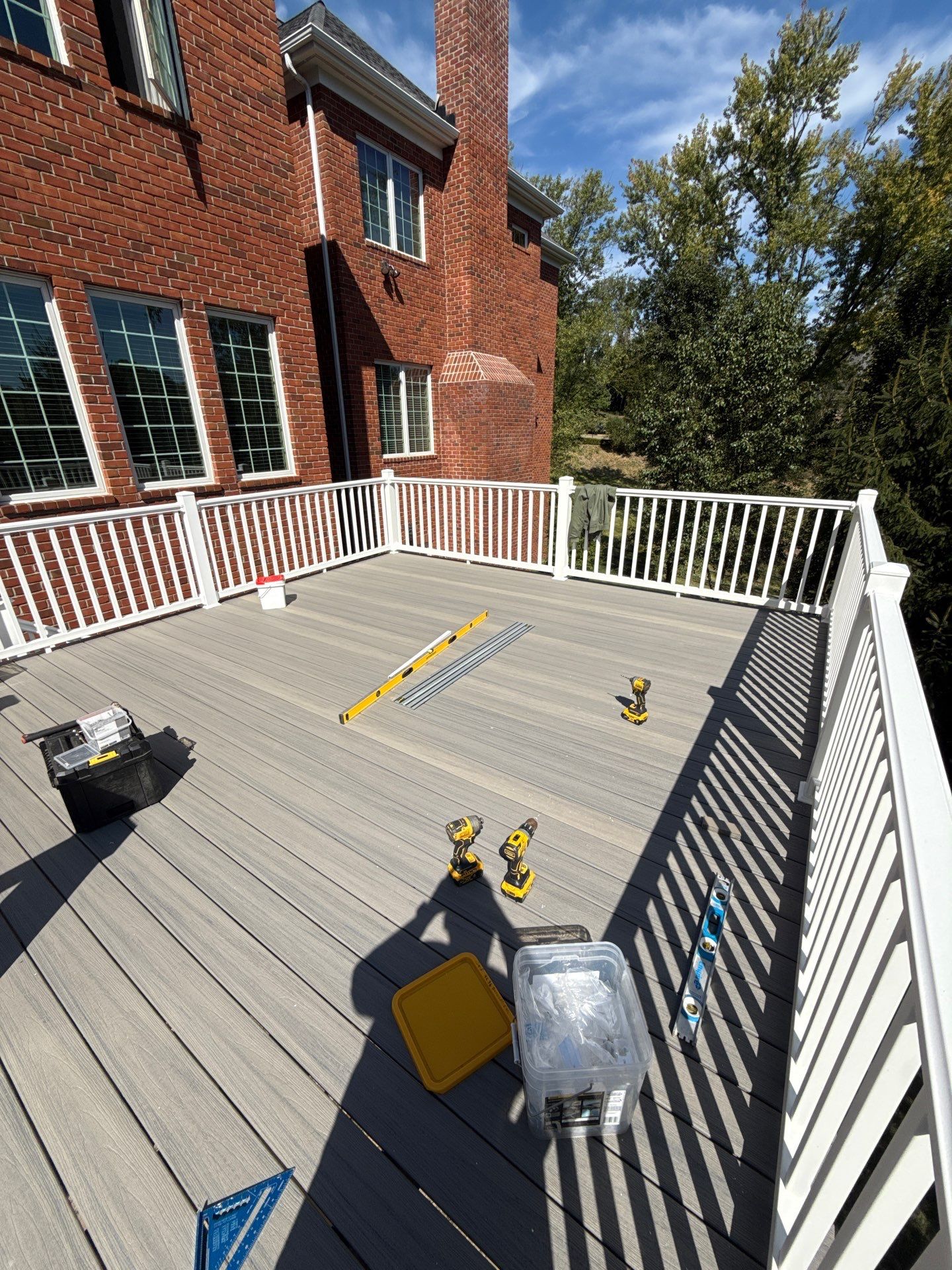 Deck extension  by Cousins Roofing Siding & Decks