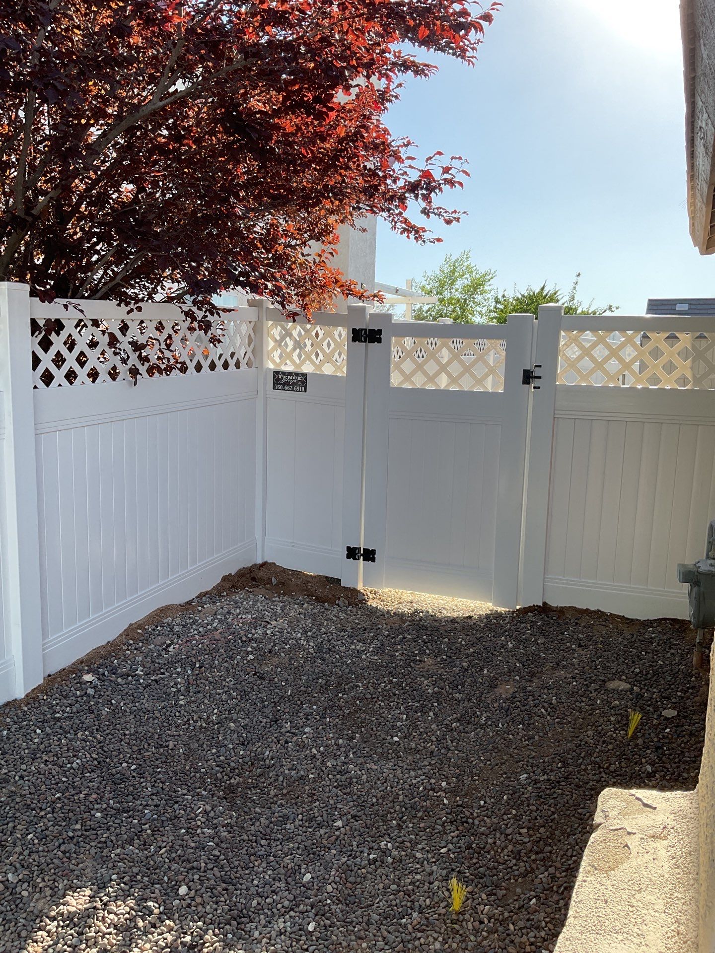 Lattice Vinyl with Privacy Vinyl Fence by Fence Guys Inc.