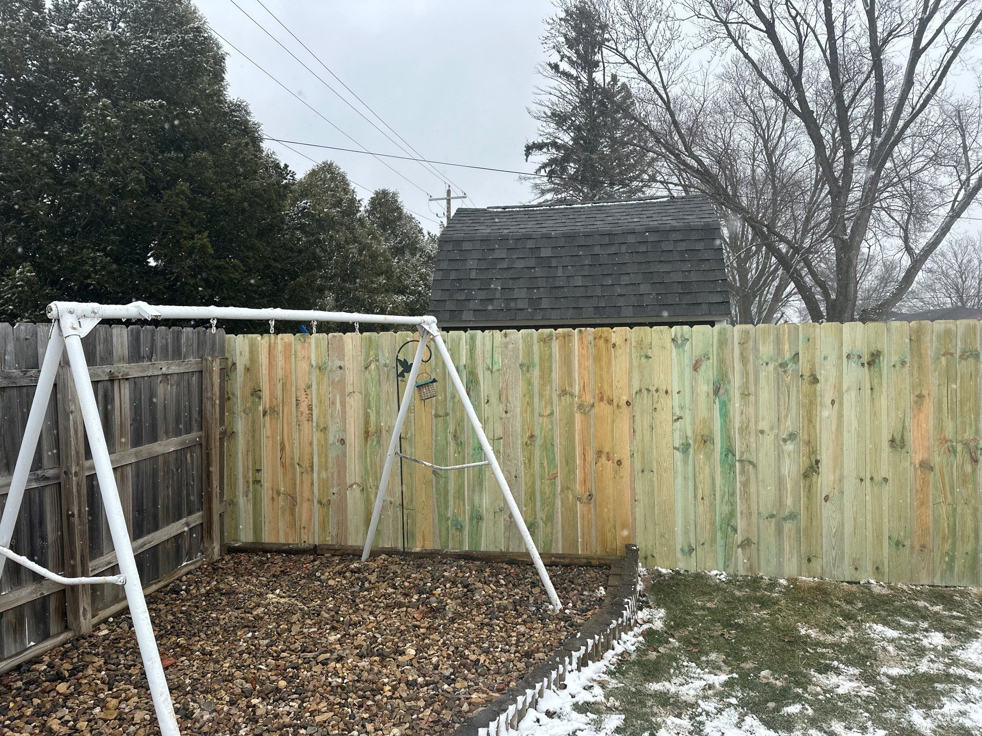 Pressure-Treated Wood Privacy Fence Replacement in Waterloo by Perfect Picket Fence and Stain