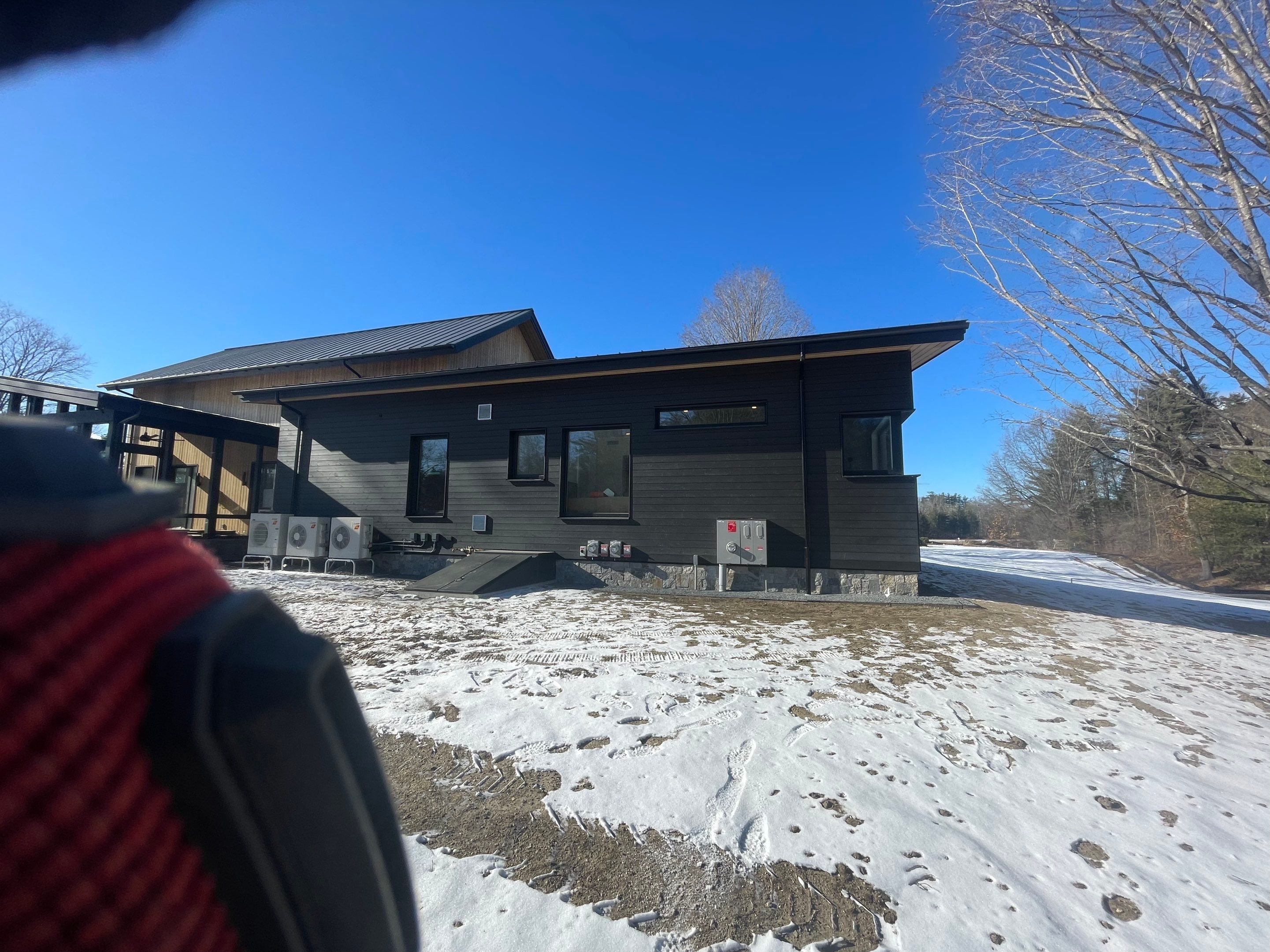 Gutter Installation using 6" Half Round Aluminum Gutter with 3" plain round aluminum downspouts and with a vinyl wedge buildout in Stow, MA. by Gutter Pro Enterprises
