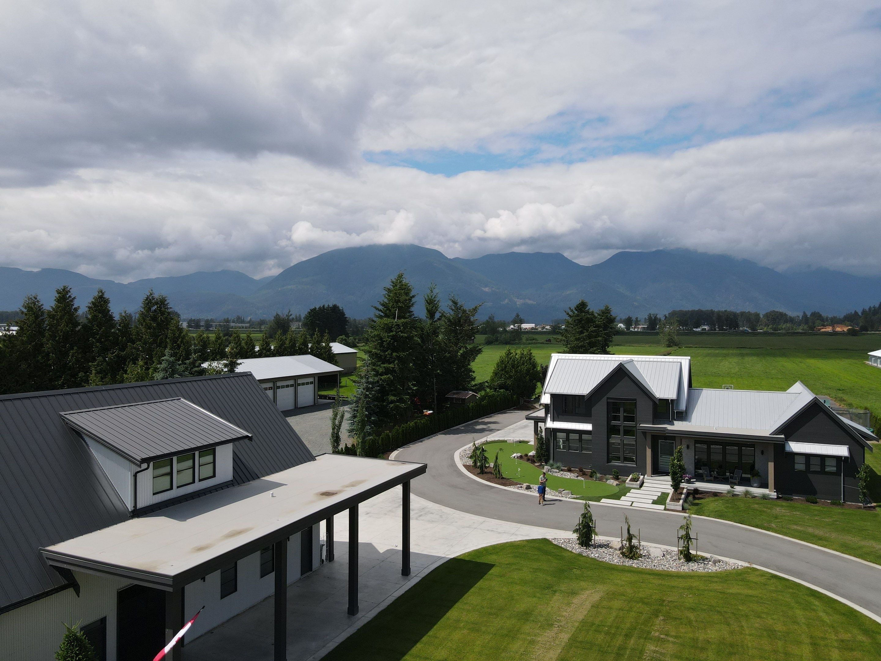 Residential Roofing Installation using 12" Prolok metal  by Top Notch Roofing Inc