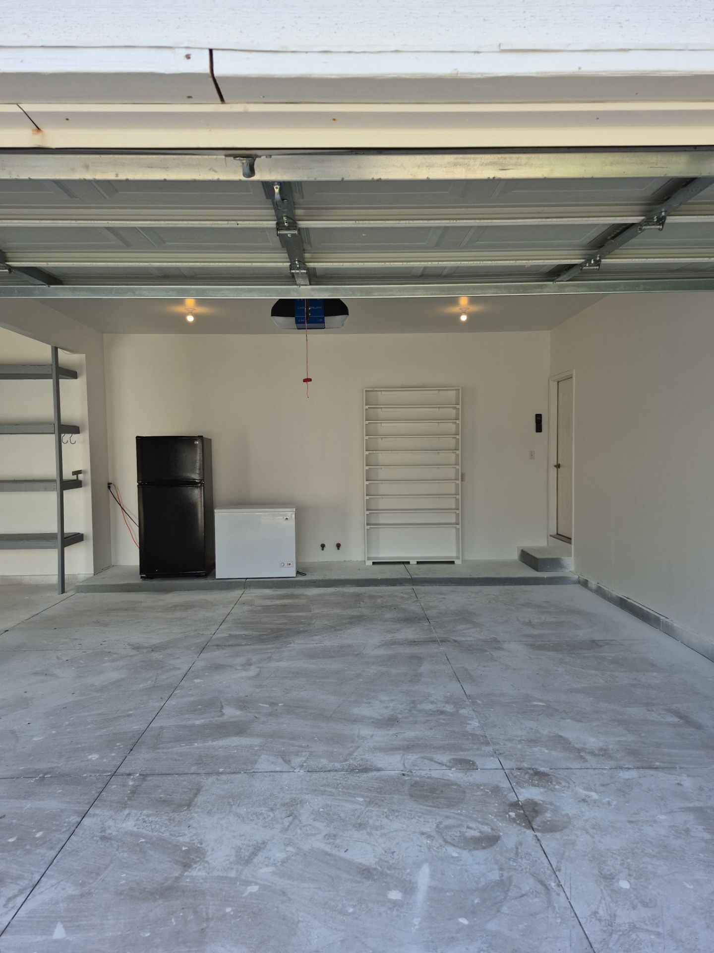 Custom Epoxy Flake Floor and Garage Wall Renovation in Ada by Gordon Painting