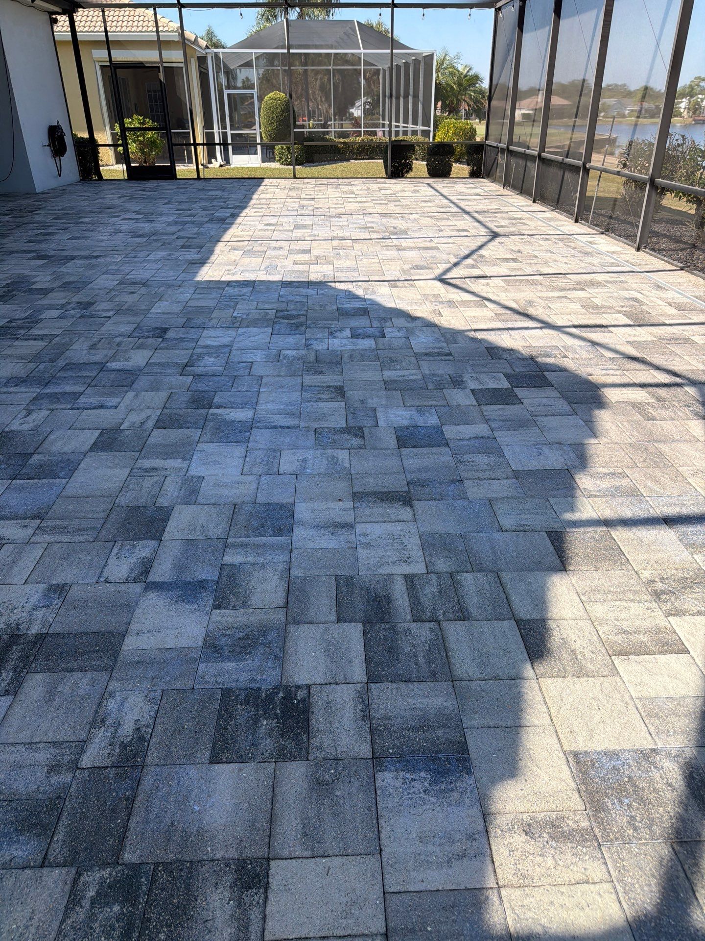 Paver Sealing and Restoration for Screened Lanai in Sun City Center by Supreme Paver Experts