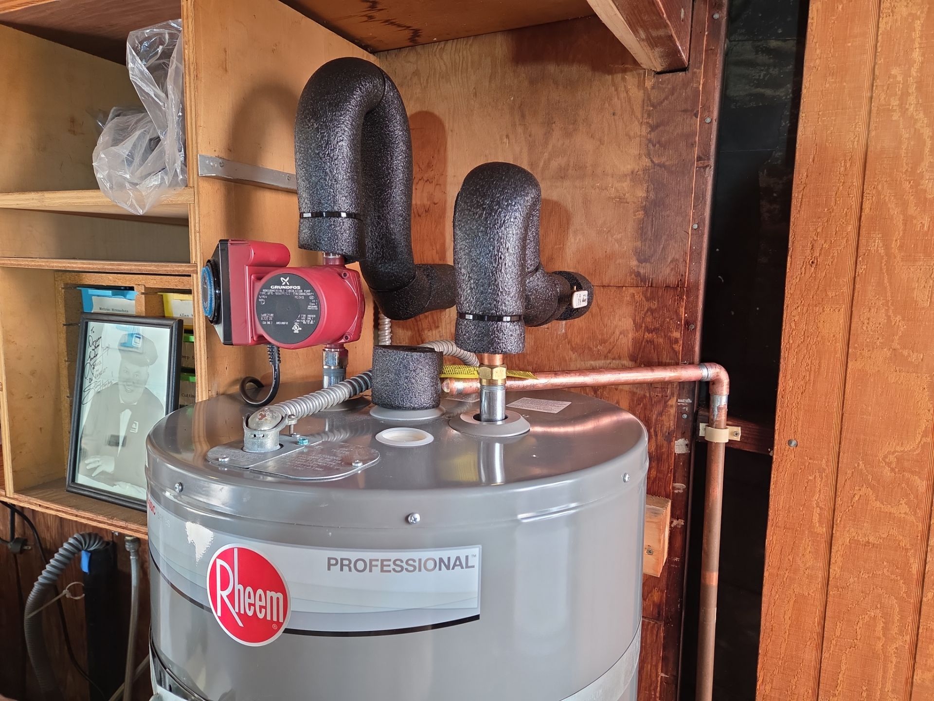 New Electric Water Heater by Professional Plumbing Inc 
