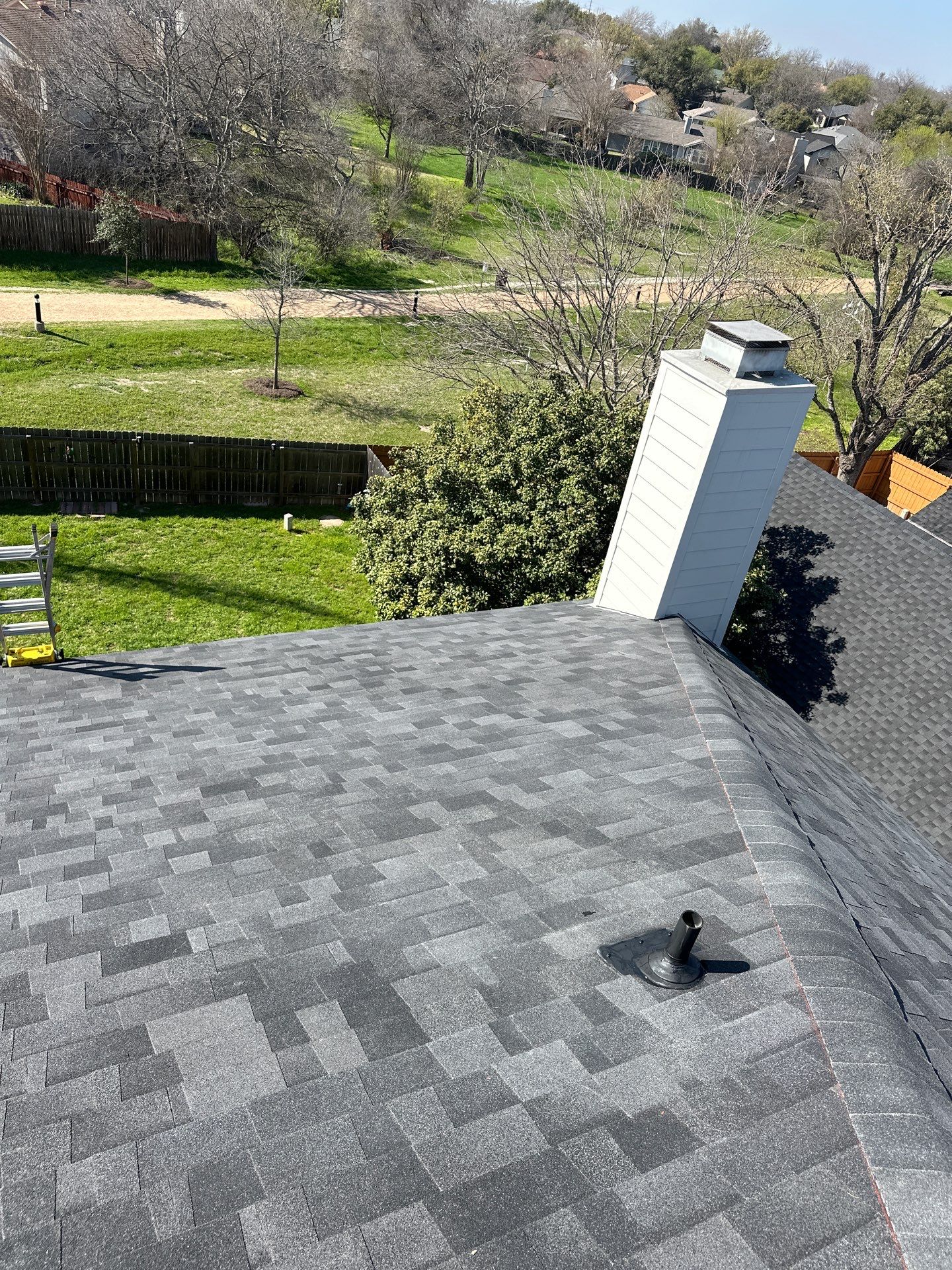 Residential Roofing Installation using Malarkey Vista Class 3 Matte Black by DeZign Roofing & Exteriors
