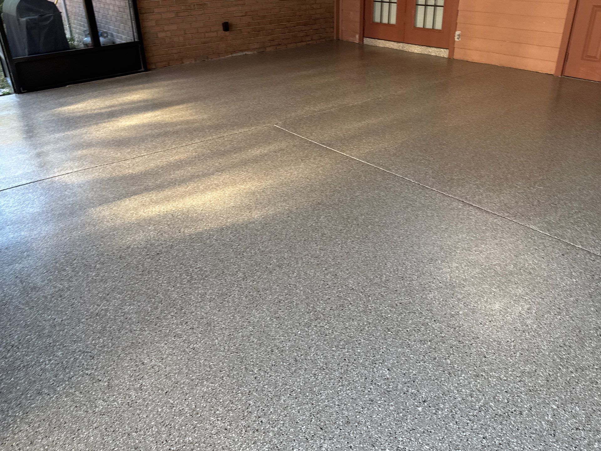 Porch in Lake City, FL in Pebble Beach by Cross Creek Concrete Coatings