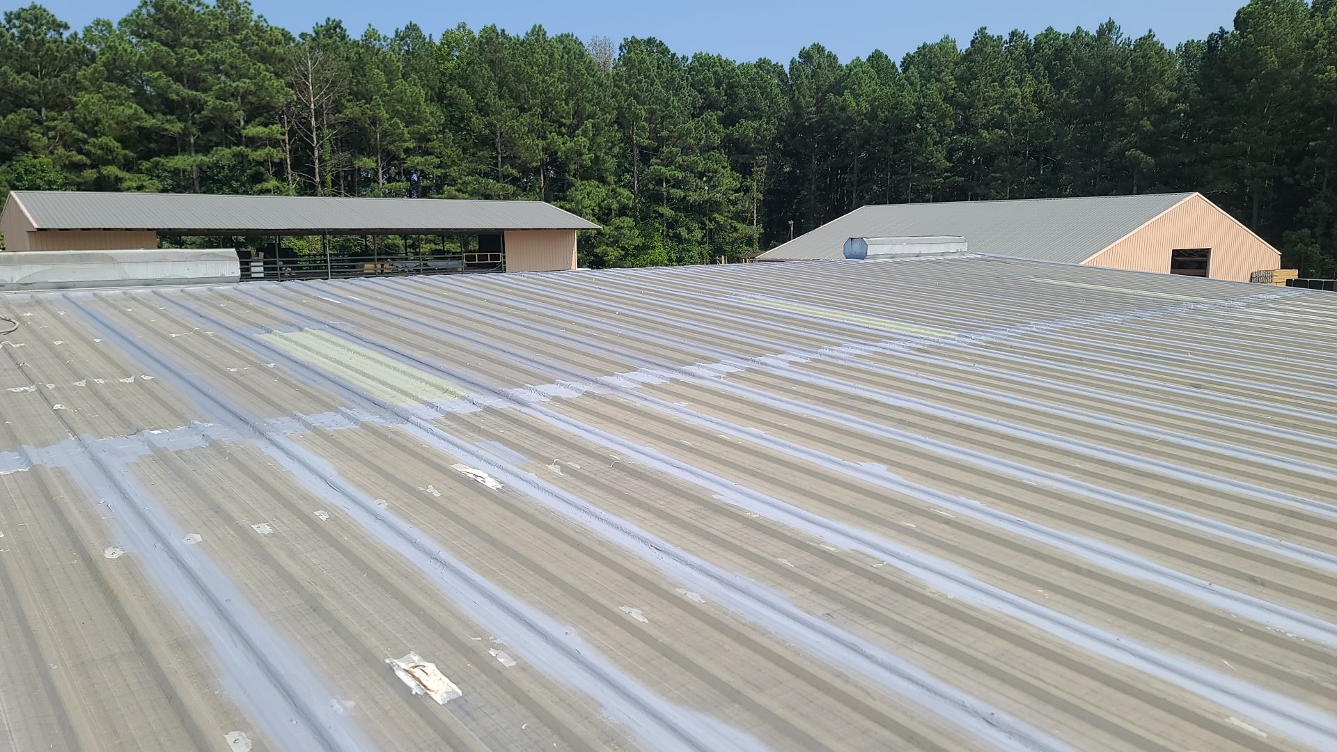 Commercial Roofing Installation using Aldocoat Coatings by Hostetler Roofing