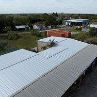 24ga 1.5" Mechanical Seam Mill Finish  by Total Roofing System The Metal Roof Experts
