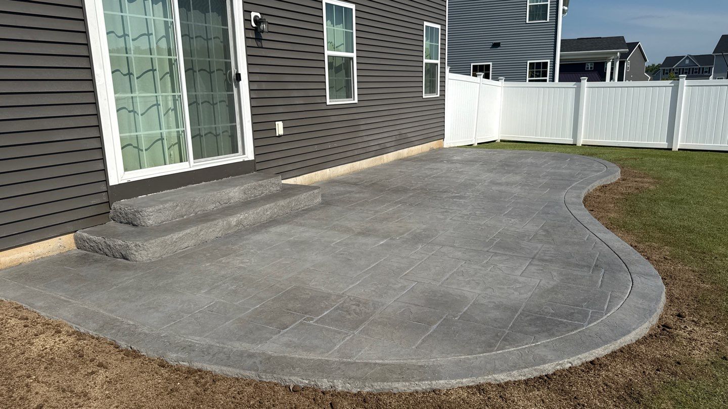 Stamped English Rivenstone Concrete Patio  by NG Masonry & Construction LLC