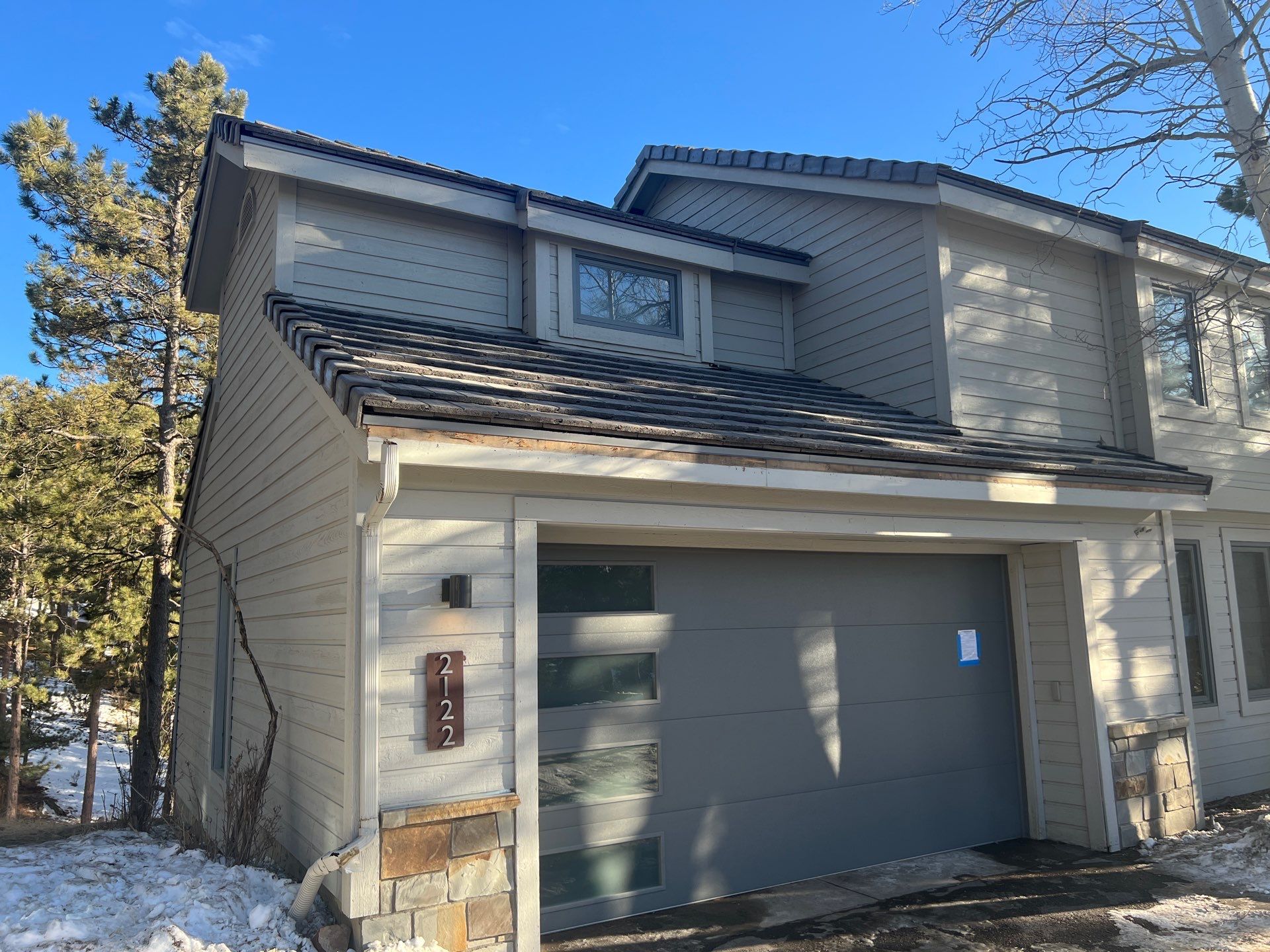 Residential Roofing Installation using Concrete Tile by Blue Peaks Roofing LLC 