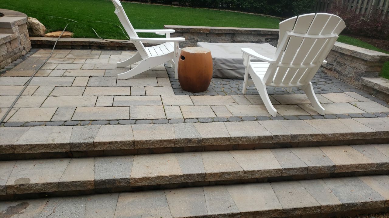 patio cleaning using cleaner by Power Wash Masters LLC