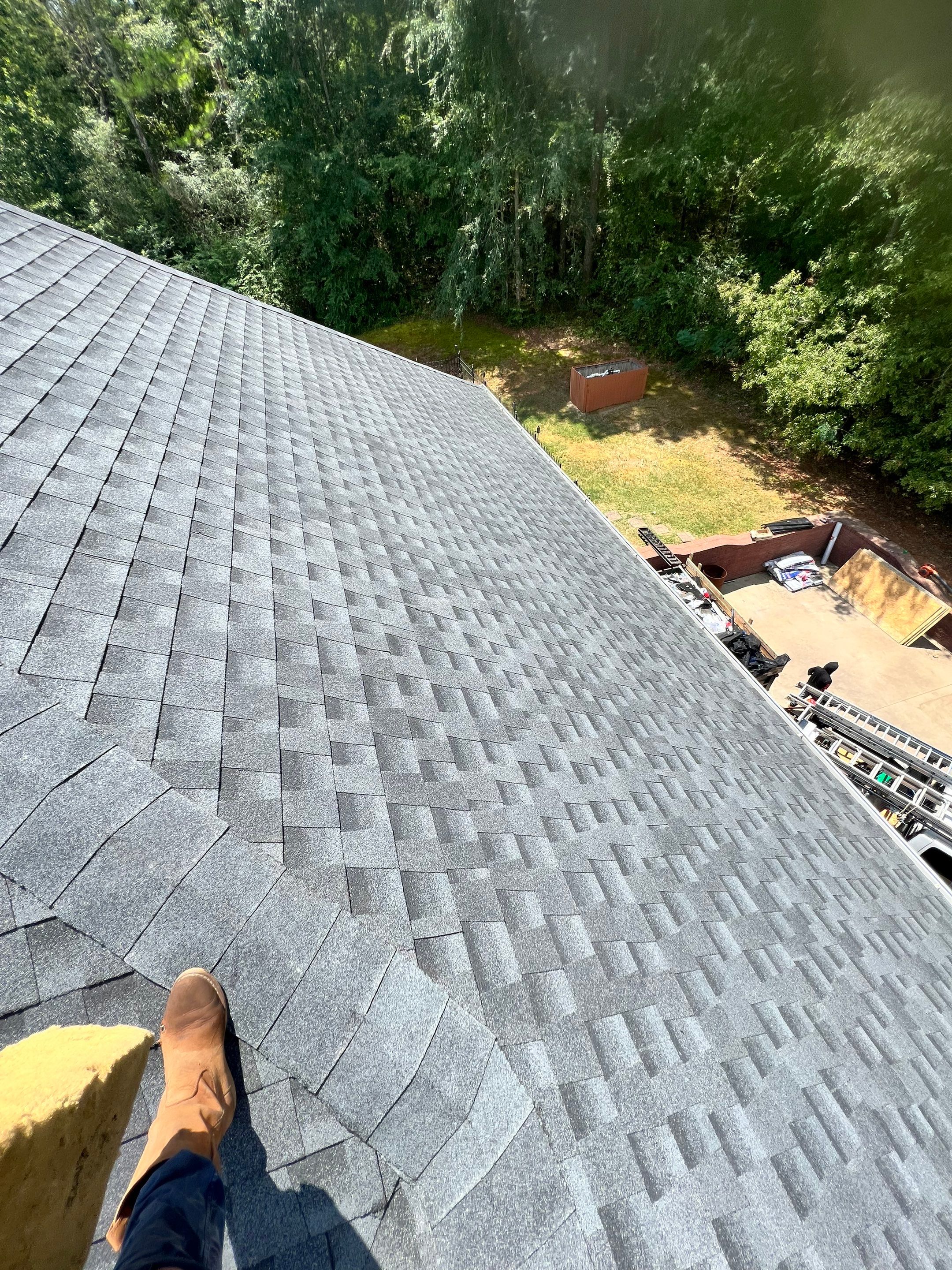Residential Roofing Installation using Architectural Shingles by The Roofing Dudes