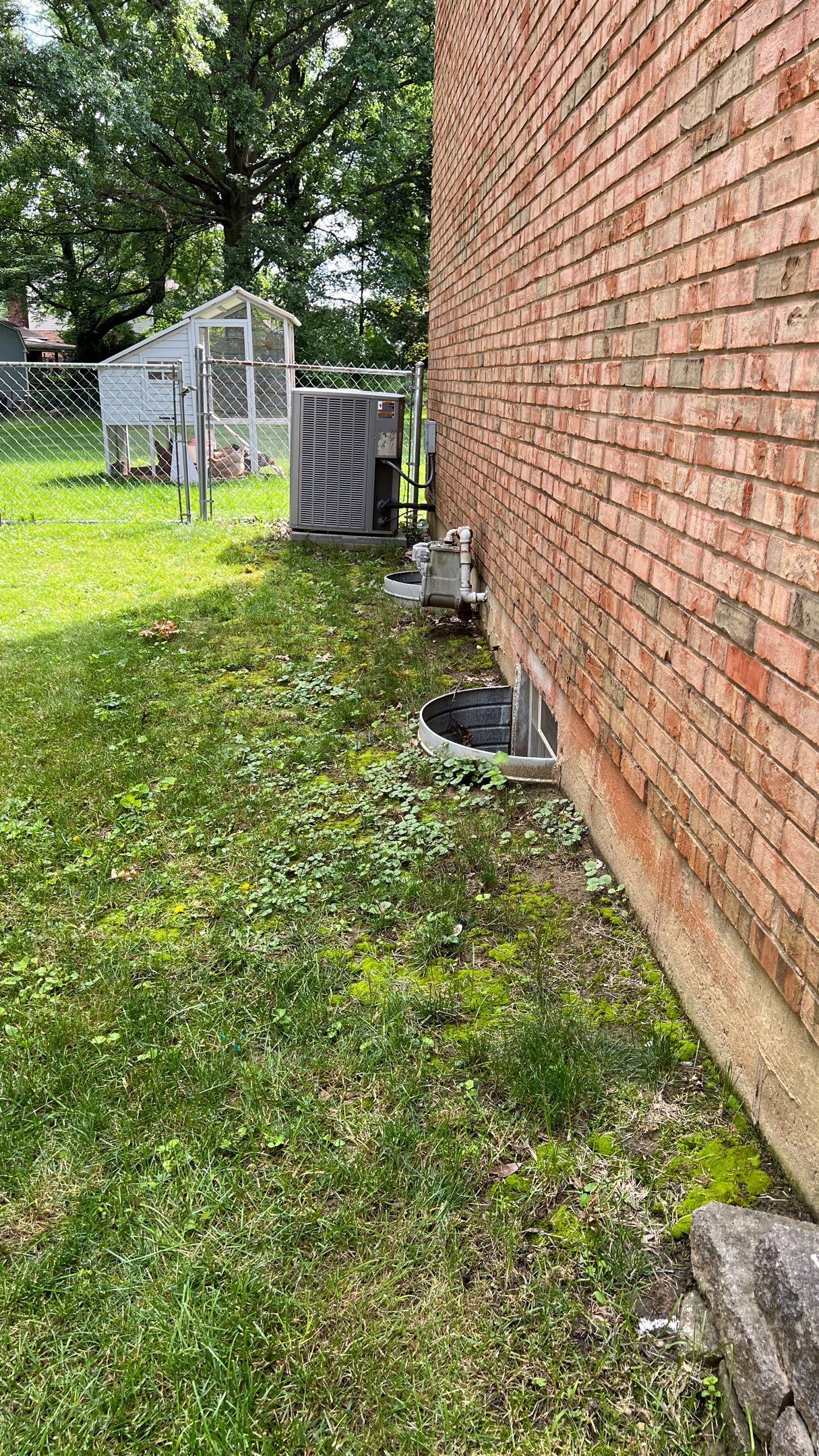French Drain Install with Oversized River Gravel and Steel Metal Edging by Reisenberg’s Lawn & Landscape, LLC