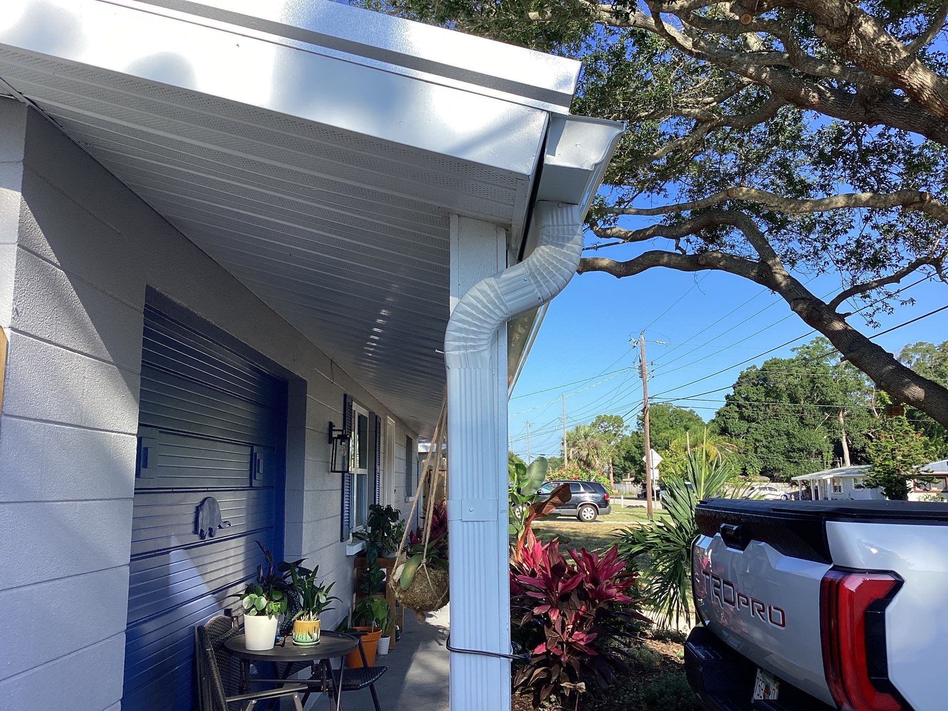 White K Style Seamless Gutters using 3X4 Elbow Downspout in Sarasota FL by Gutter Professors