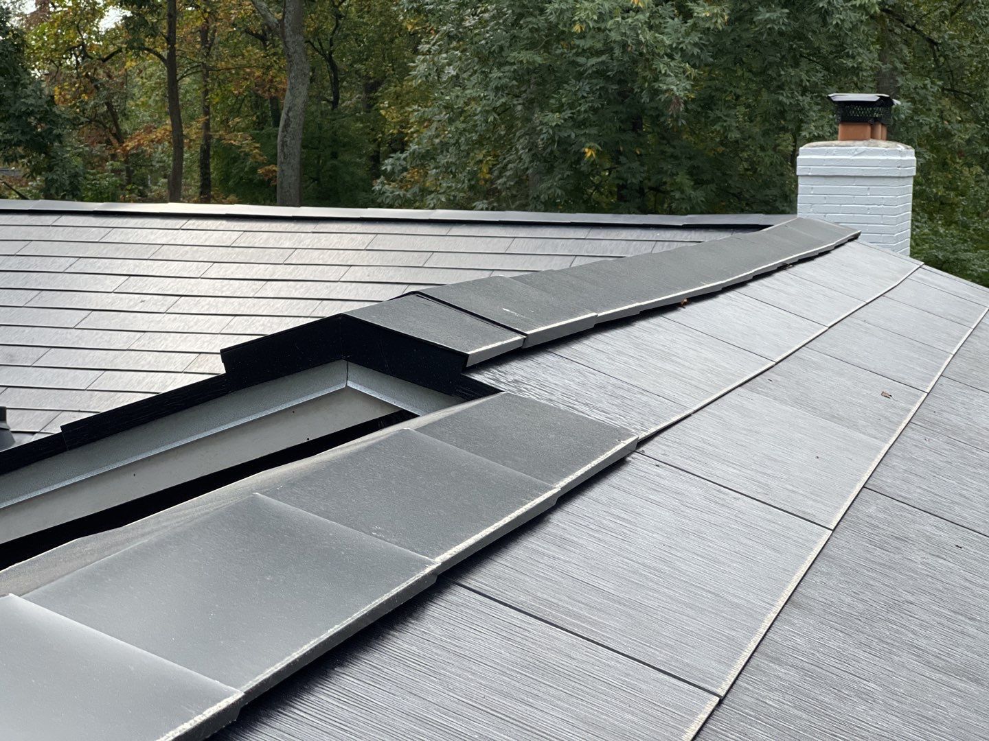 Tesla Solar Roof Replacement using Tesla Solar Roof V3 Tiles by American Home Contractors