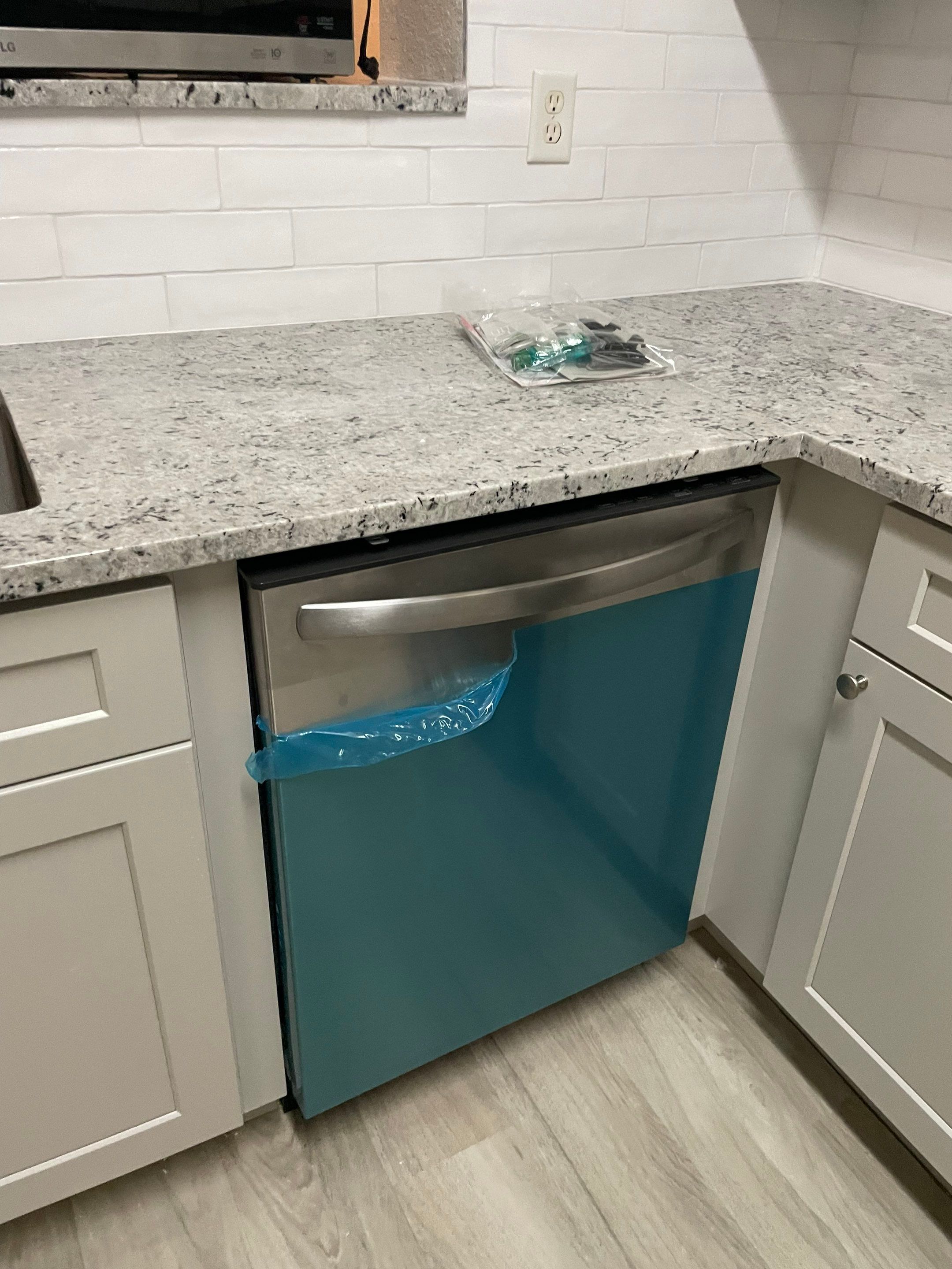 Home Remodel using LVP Flooring and Cabinets by HandyMangum