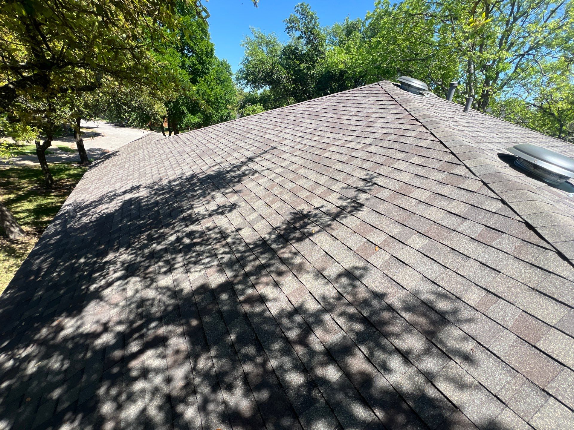 Rental property upgrade using CertainTeed Landmark shingles. by Oakwood Roofing and Construction, LLC