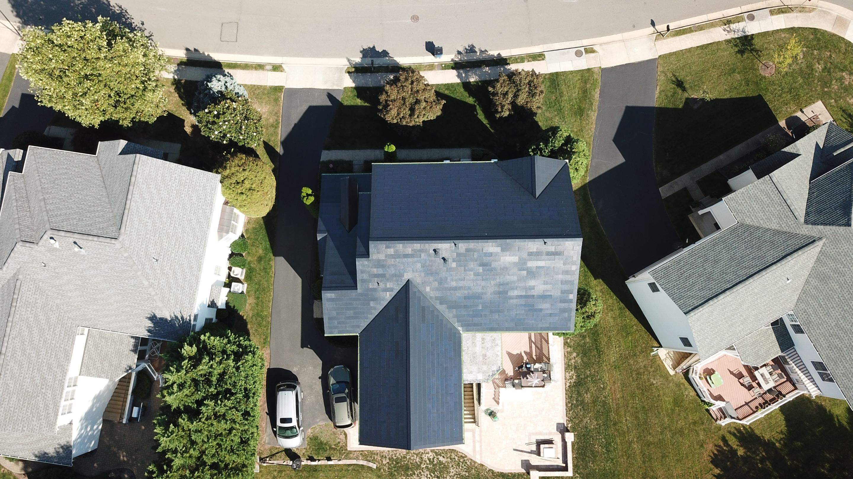 Tesla Solar Roof Replacement using Tesla Solar Roof V3 tiles by American Home Contractors