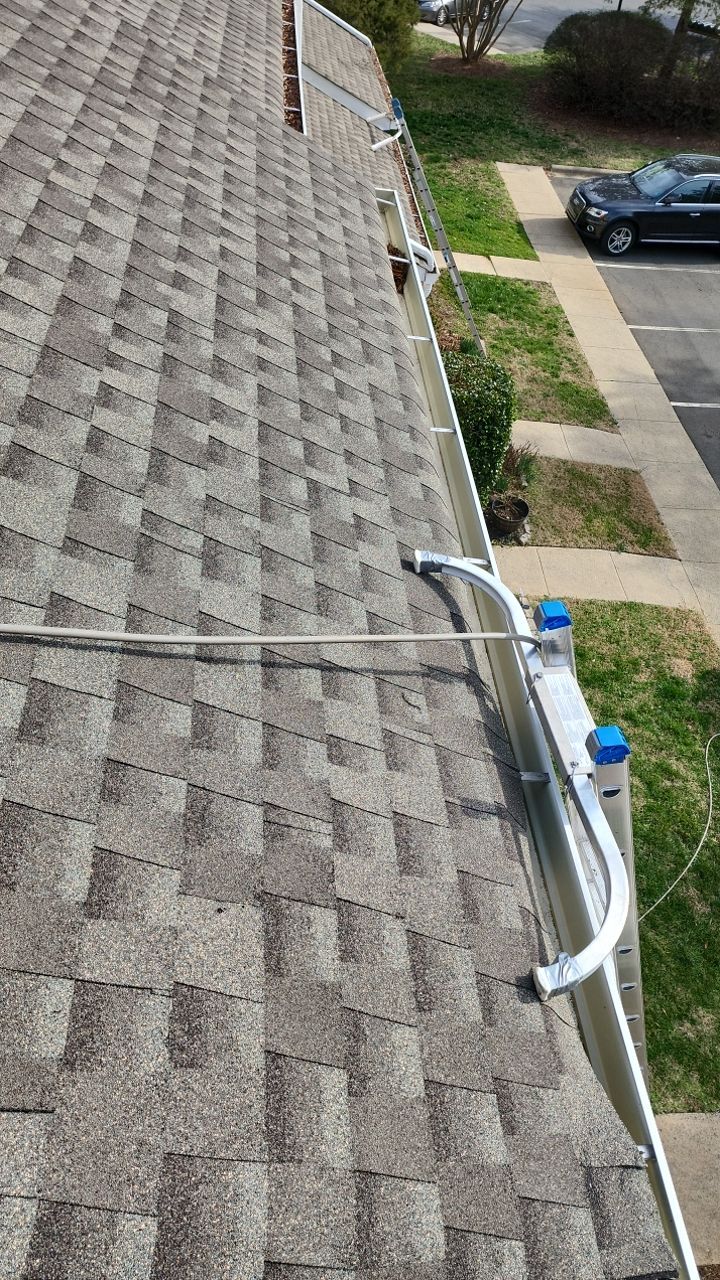 Gutter Cleaning using water by Power Wash Masters LLC