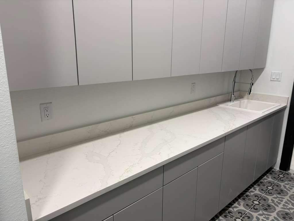 A home with a mix of quartz options by Mena stone surfaces