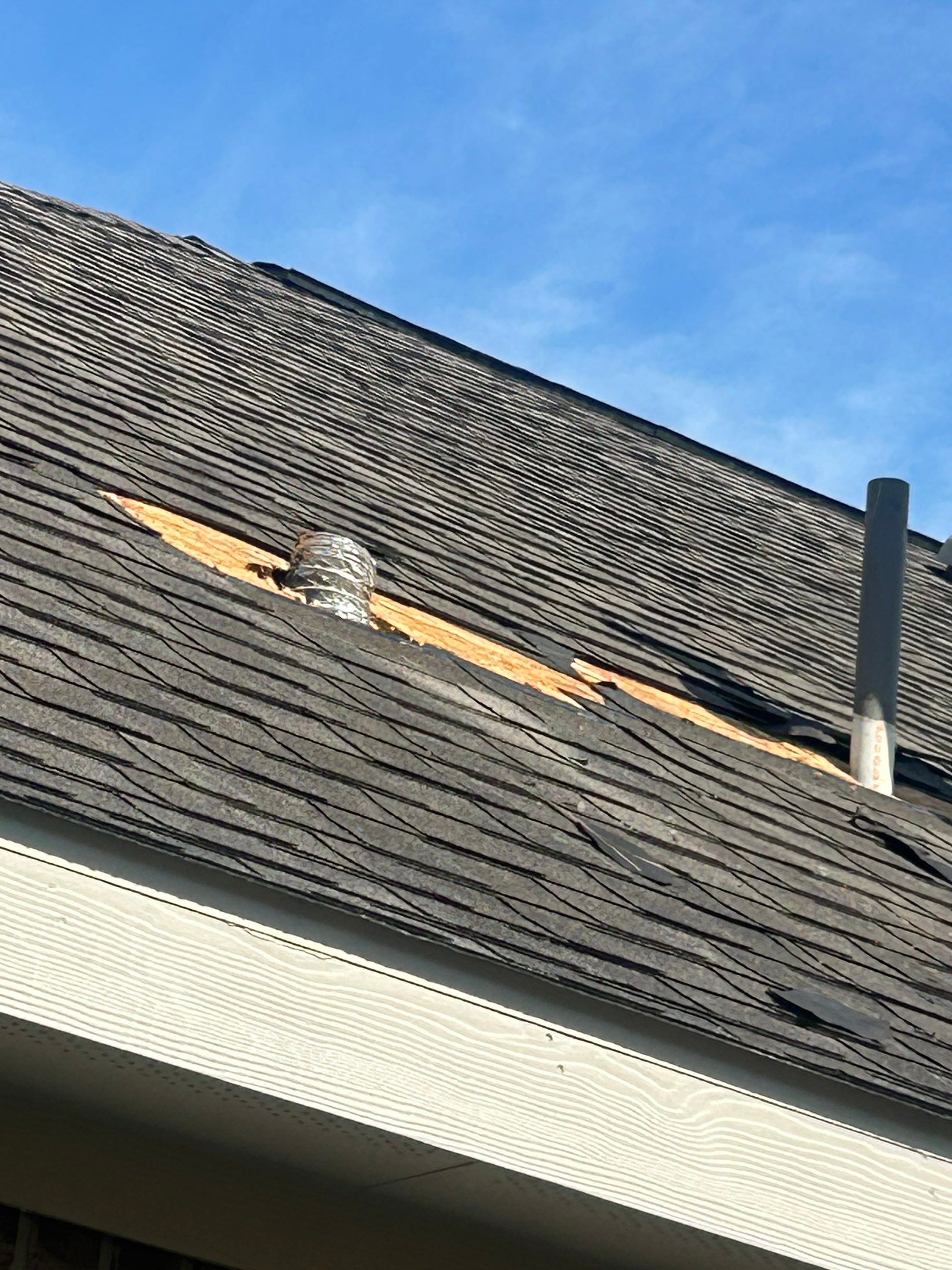 Hail Damage using Owen's Corning Duration (Lifetime) Shingles by Roof Repair Company