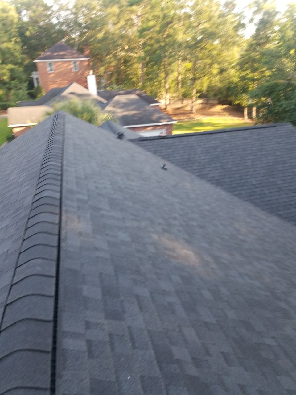Residential Roofing Installation using Roof Replacement by American Roofing & Construction LLC
