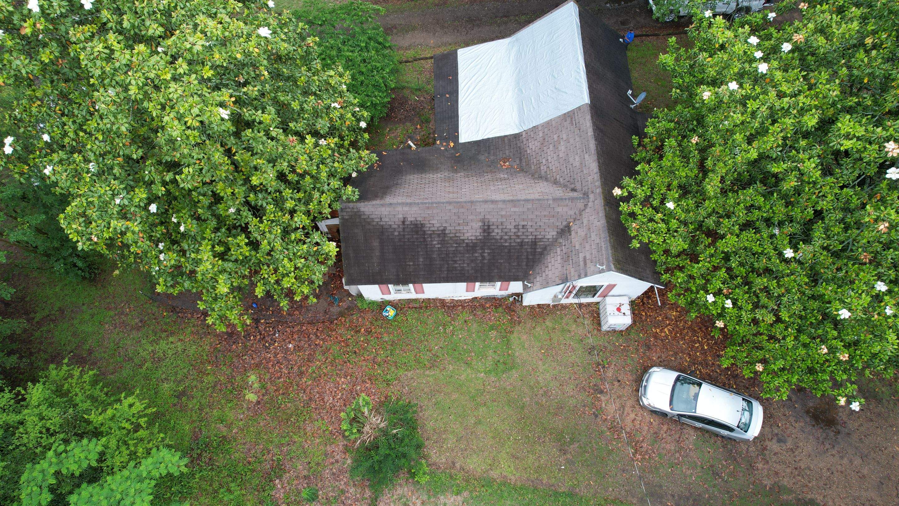 Storm Restoration Reroof: 25 Year 3-Tab Shingle by Hostetler Roofing
