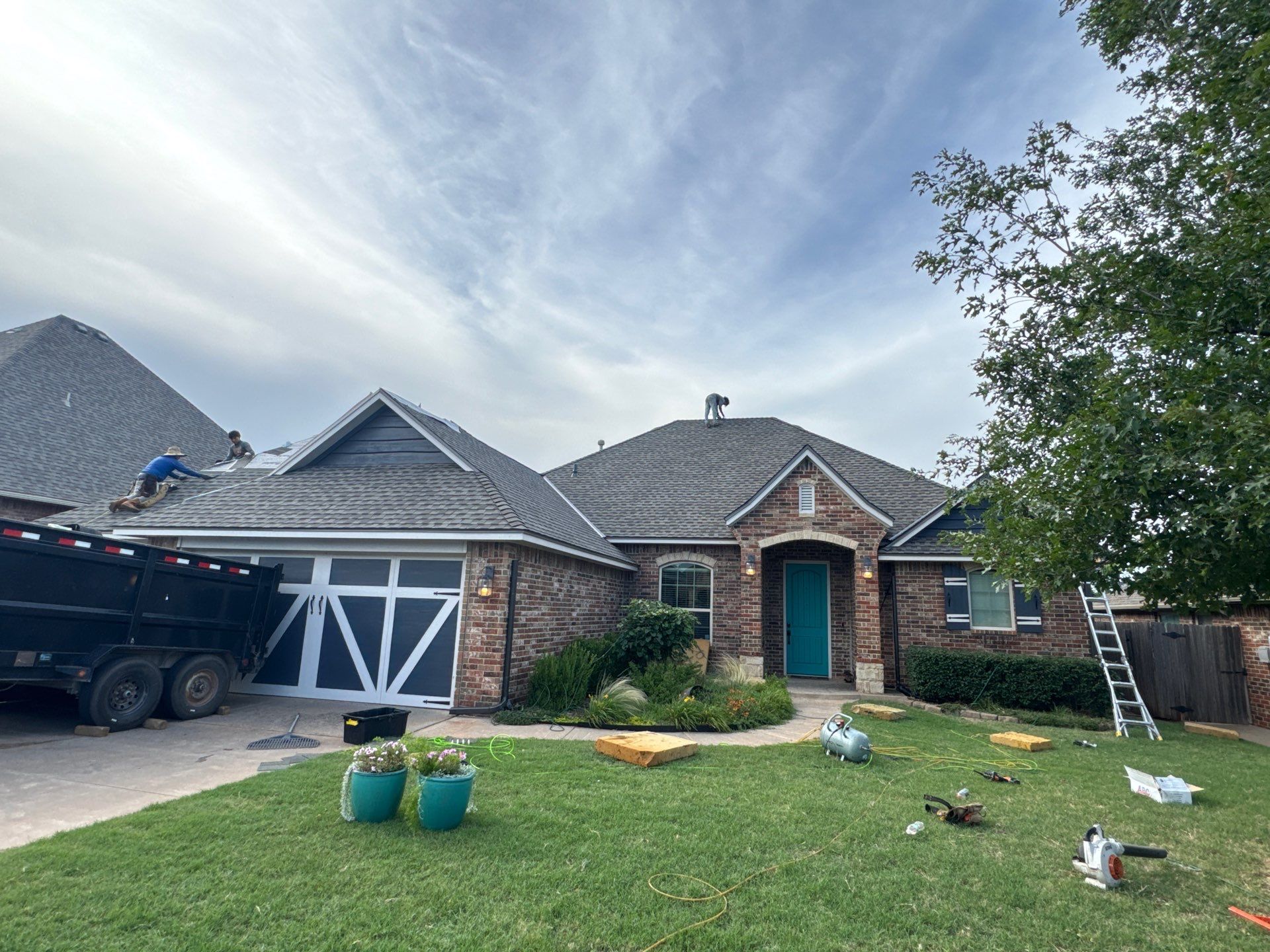 GAF Architectural Shingle Roof Replacement and Decking Repair in Mustang by 5Coat Roofing & Construction