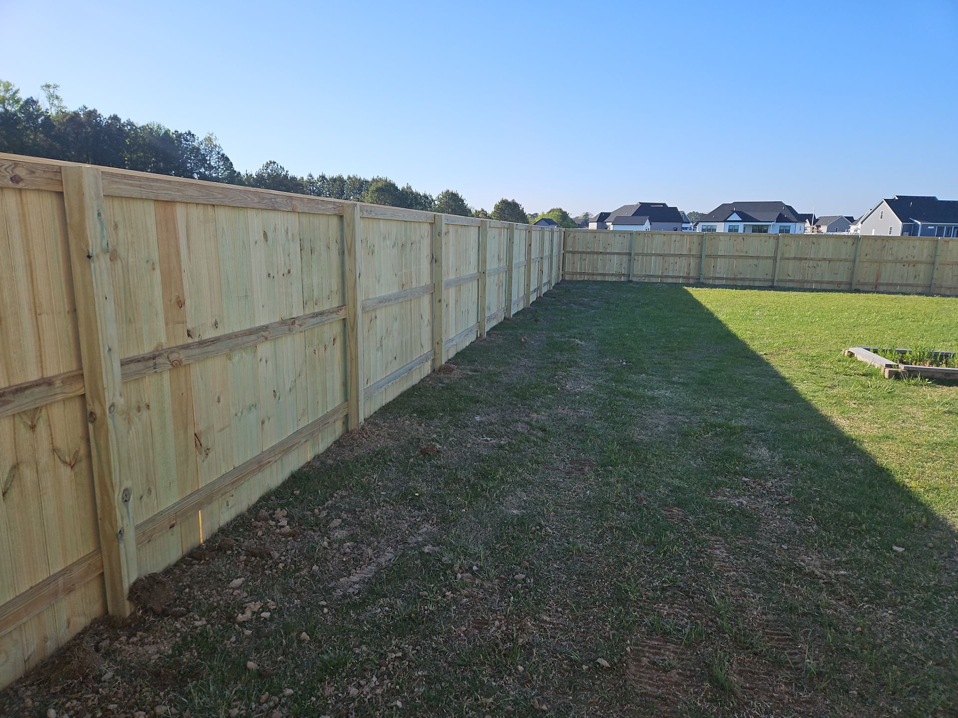 Stronger. Sleeker. Wood. by Tidewater Fence