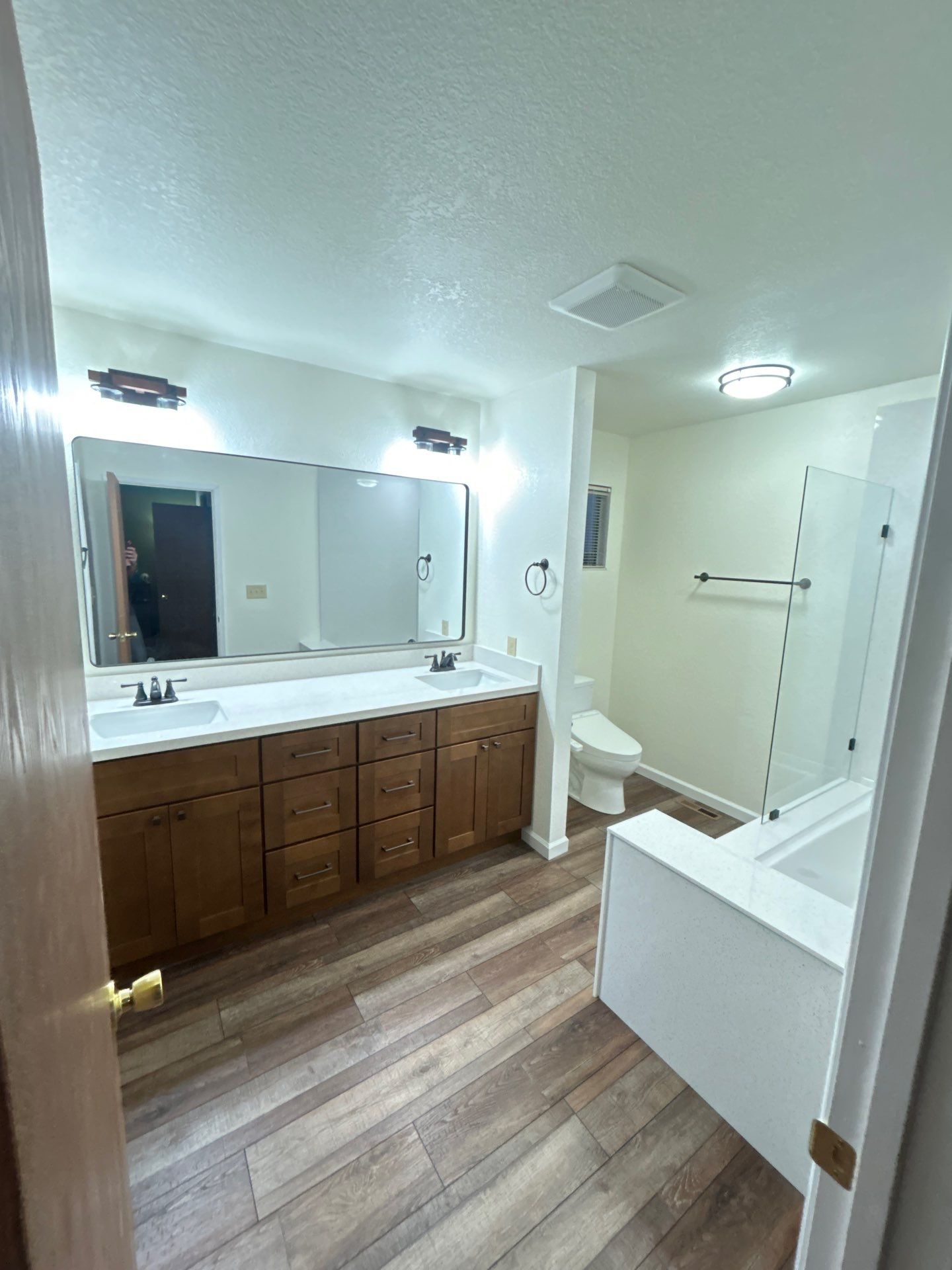 Bathroom Remodel with Double Vanity and Quartz Counters in Vacaville by H4H Remodeling and Repairs Inc.