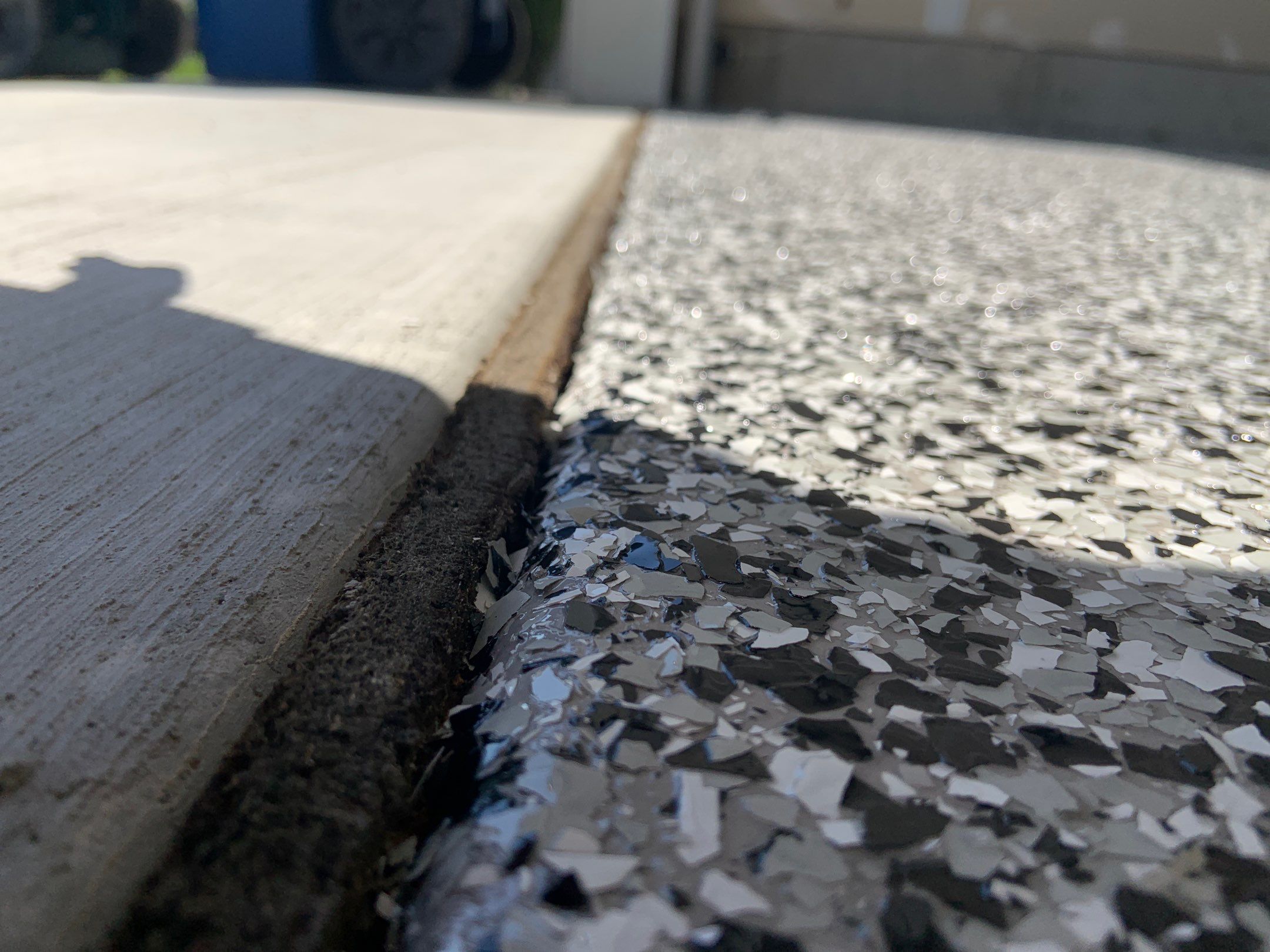 Garage Transformation using Domino by Croc Coatings, LLC