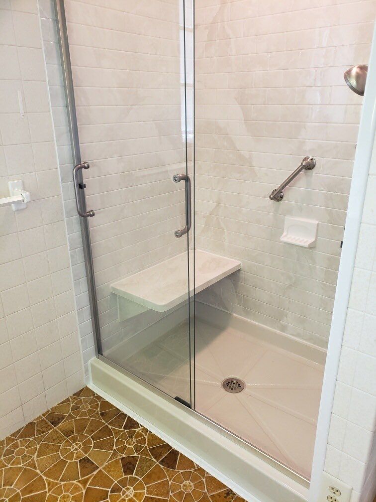 Shower Replacement using BCI Acrylic Shower System by Secure Construction Company Inc