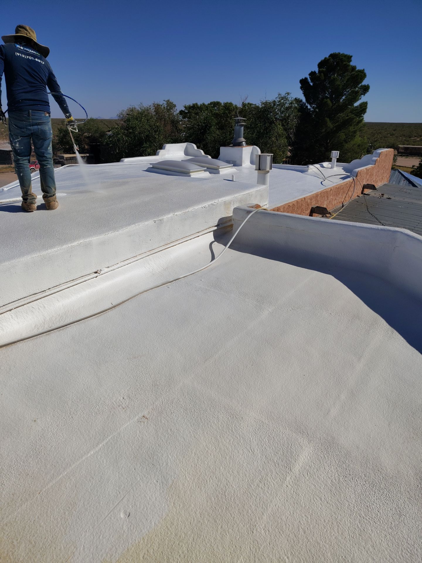 Residential roof application by SPF Services 