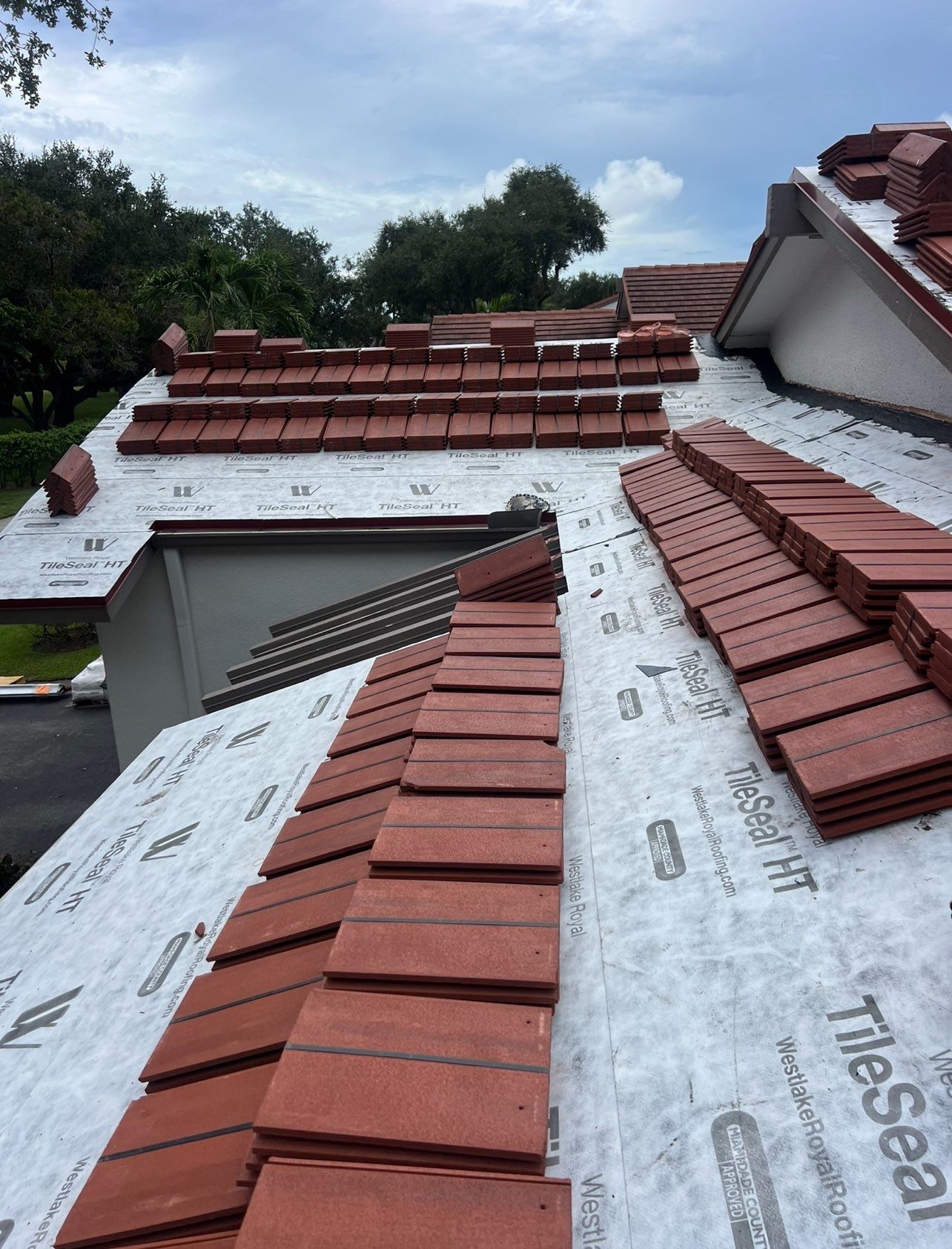 Full Tile Roof Replacement and Sheathing Repair in Deerfield Beach by Aastro Roofing