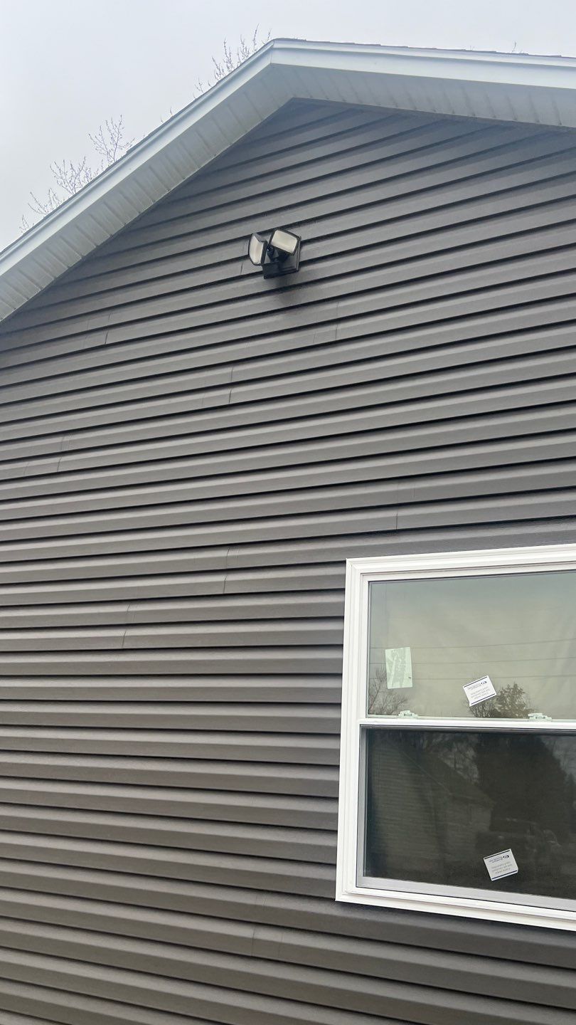 Residential fascia replacement using Exterior Portfolio 4.5 DL - Peppercorn by Nitro Roofing and Construction