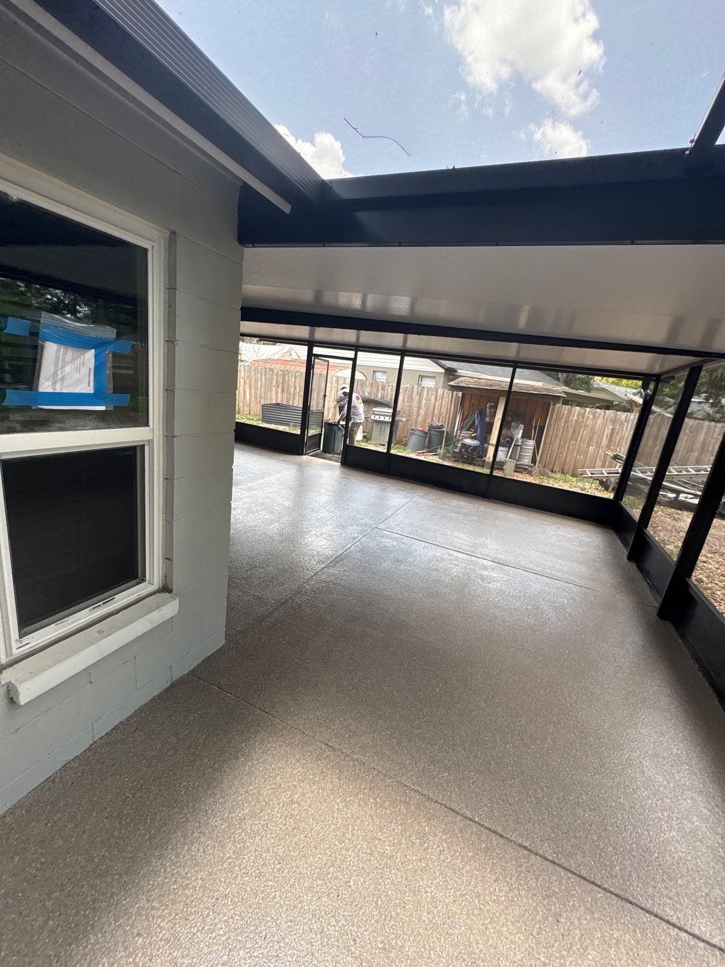 Screened-in Lanai Polyaspartic Floor Coating Installation in Riverview by Performance Floors & Coating