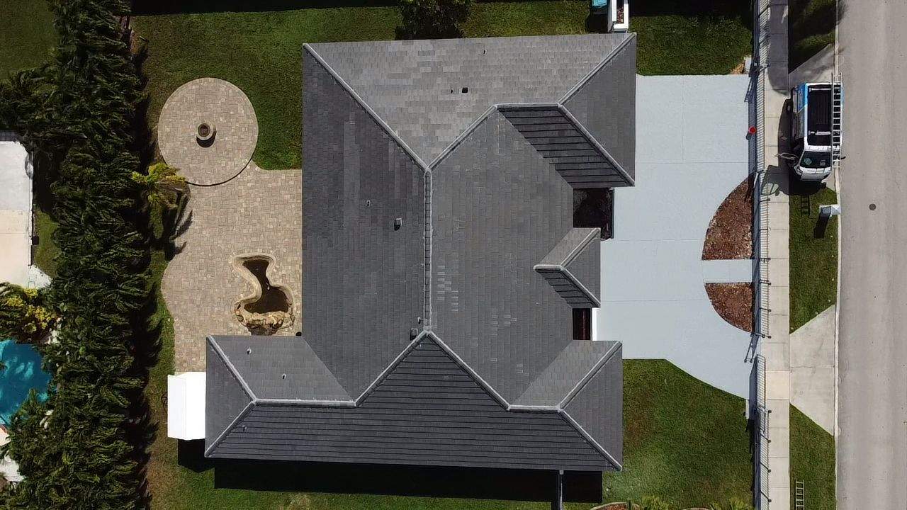Residential Roofing Installation using Tile Roof by City Roofing Inc